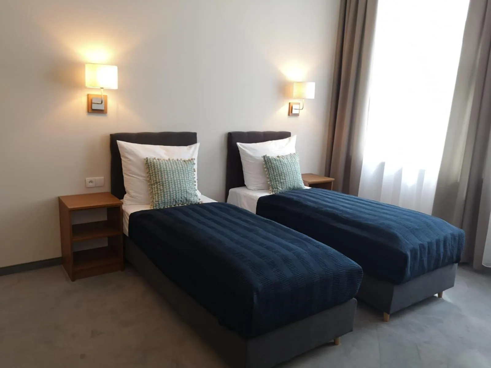 Bed in Brassel Aparthotel