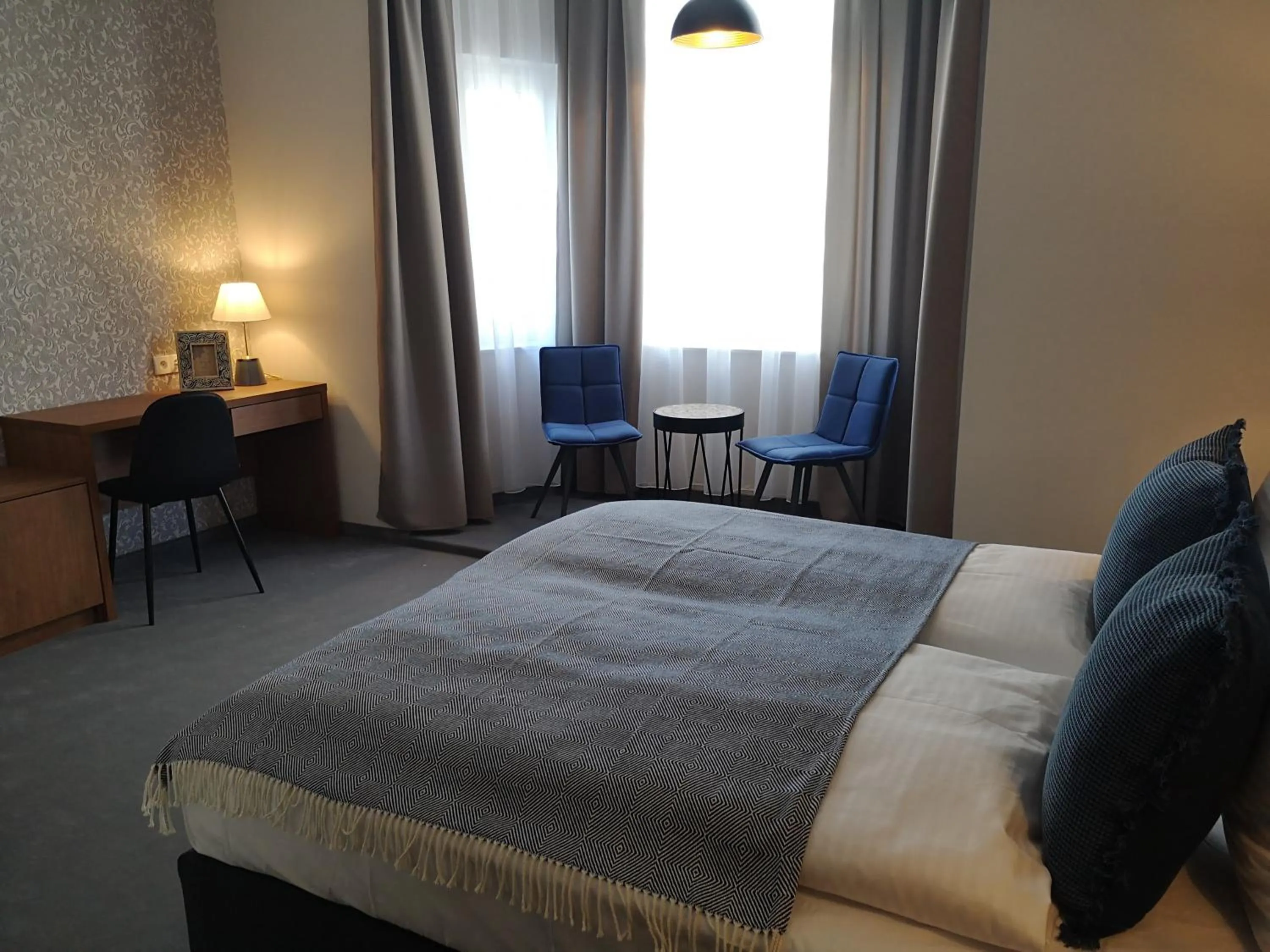 Bed in Brassel Aparthotel