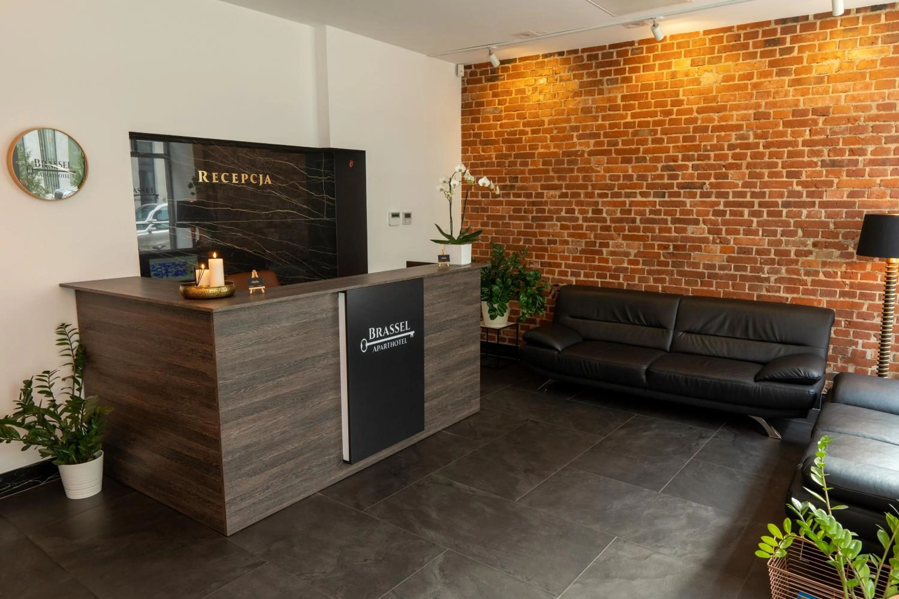 Lobby or reception in Brassel Aparthotel