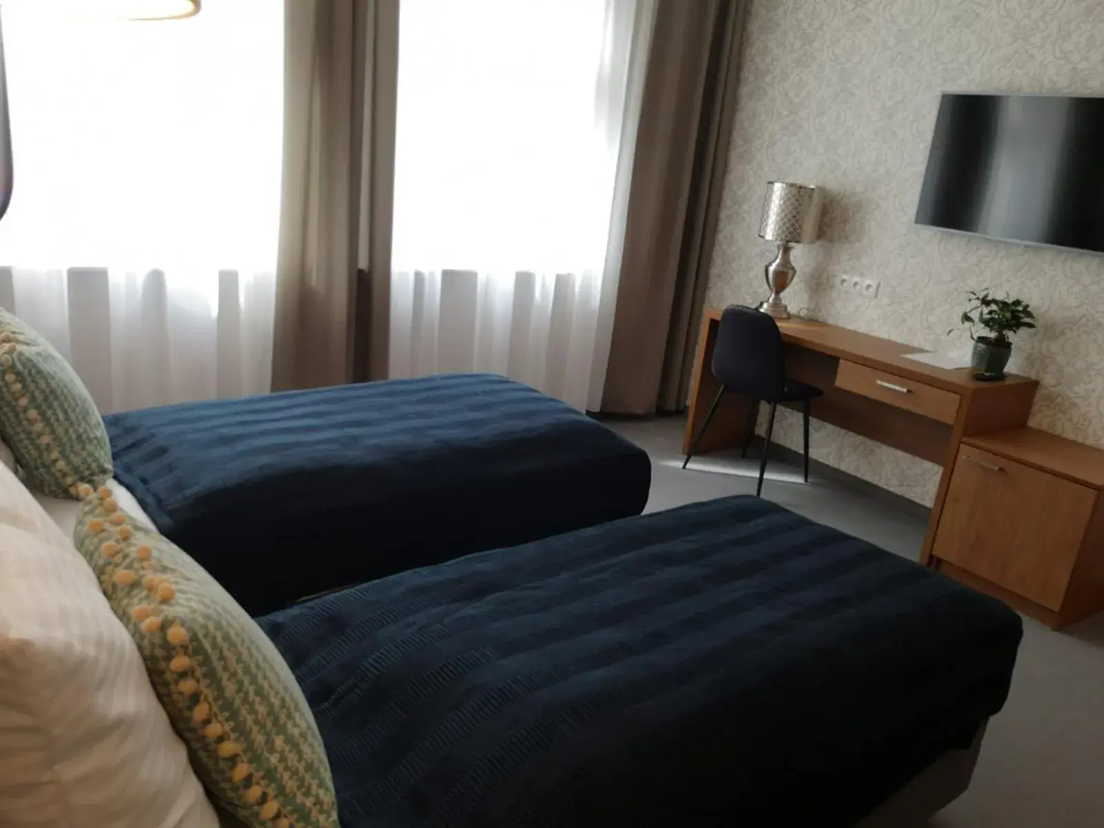 Twin Room in Brassel Aparthotel Twin Room in Brassel Aparthotel