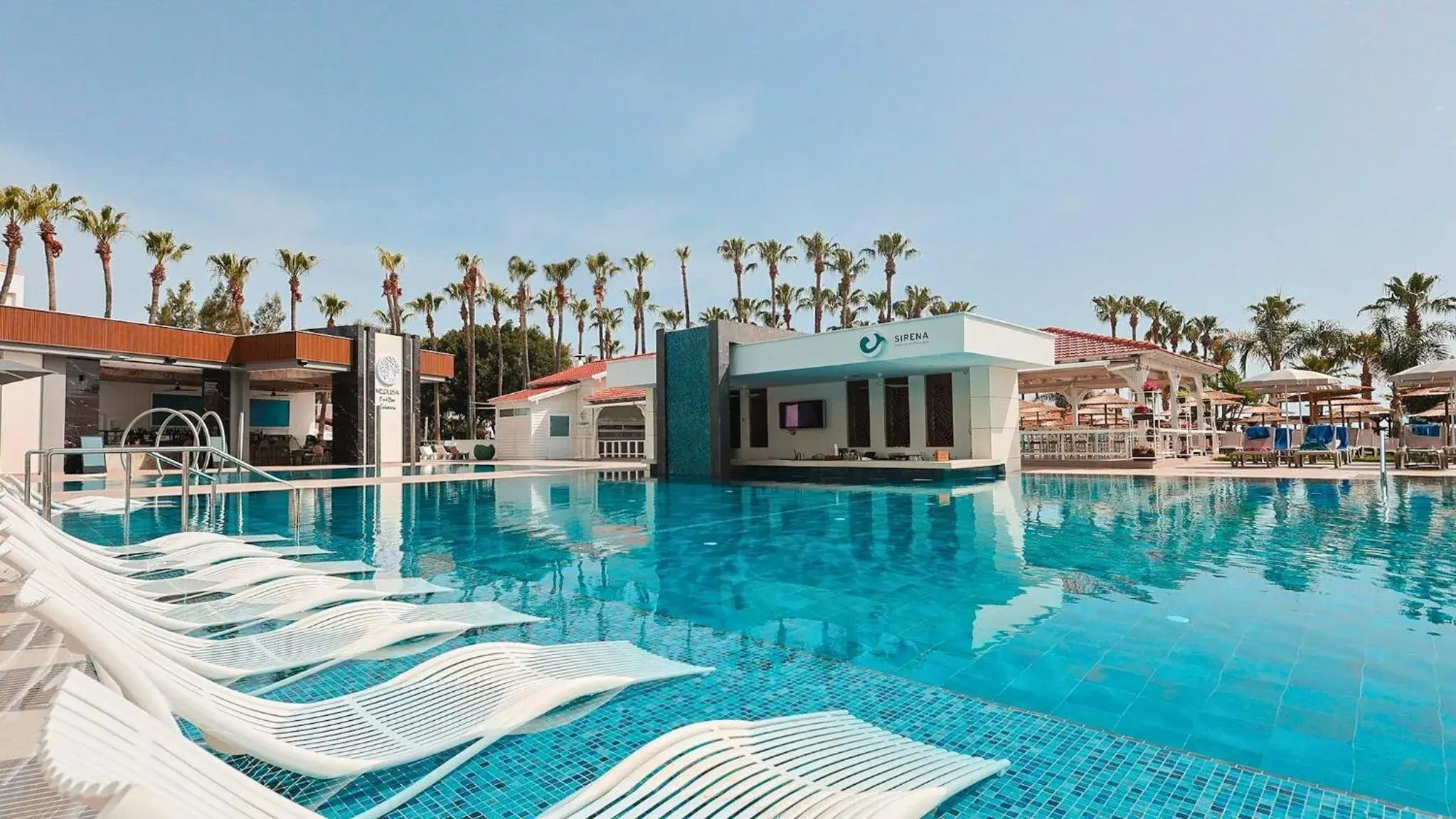 Swimming pool in Cavo Maris Beach Hotel Swimming pool in Cavo Maris Beach Hotel