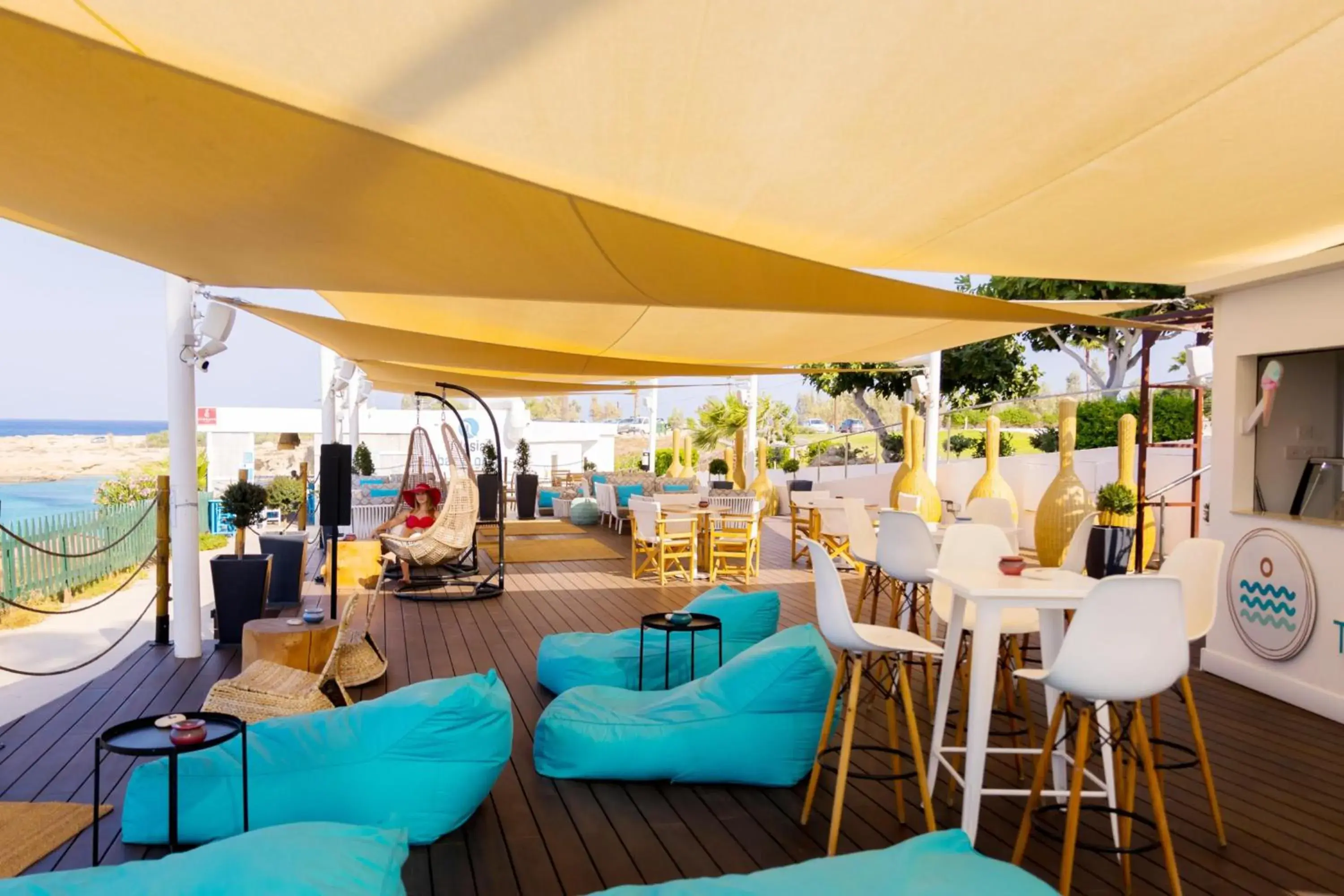 Lounge or bar in Cavo Maris Beach Hotel Lounge or bar in Cavo Maris Beach Hotel