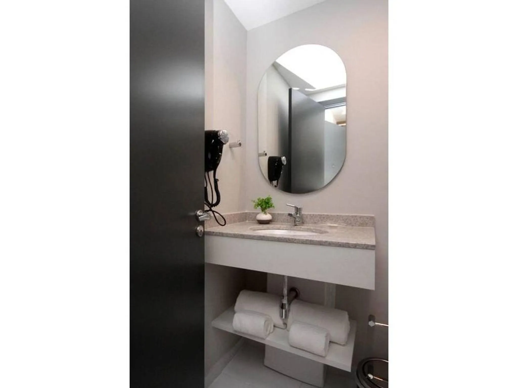 Toilet in 360 Suítes Sé