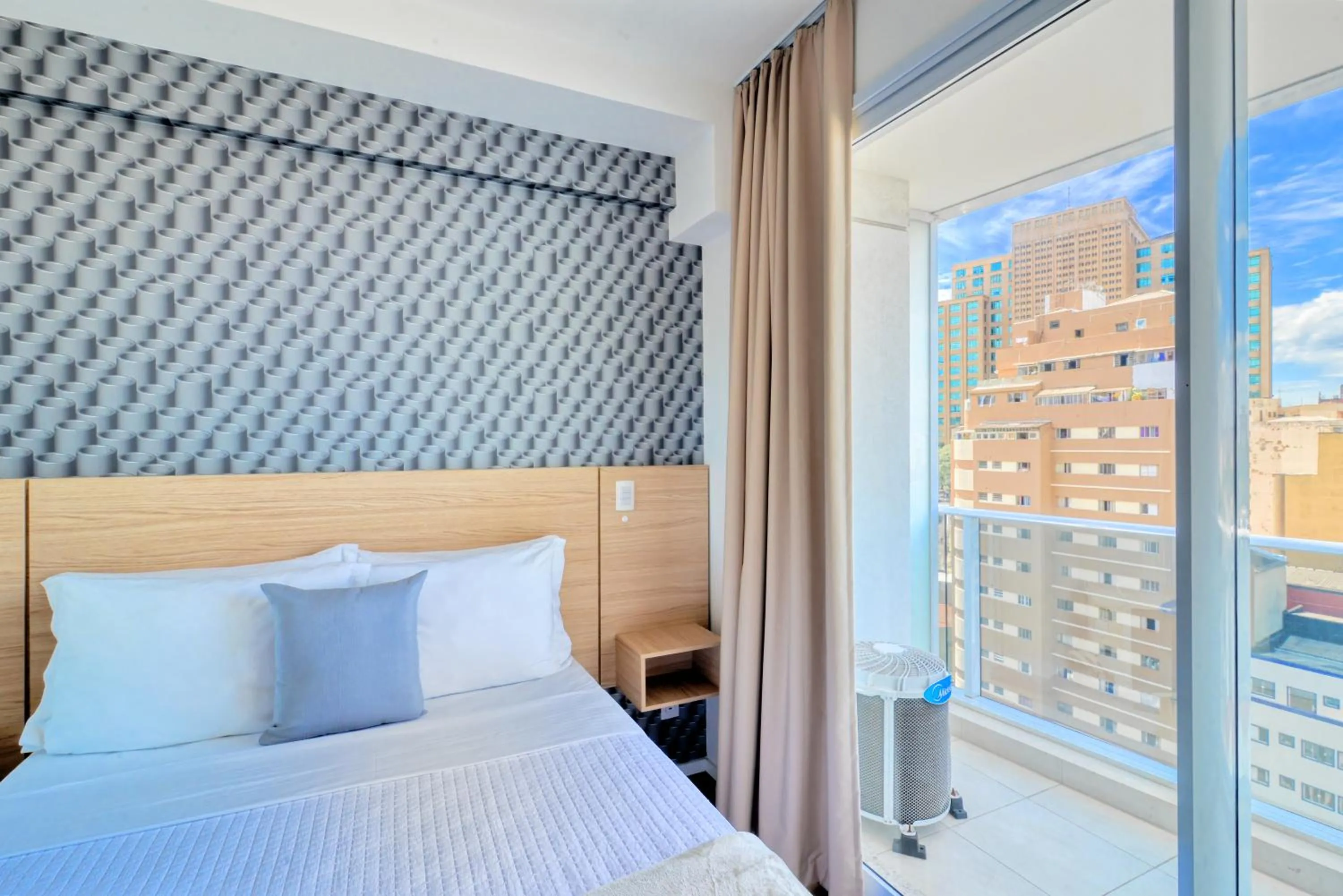 Bed in 360 Suítes Sé