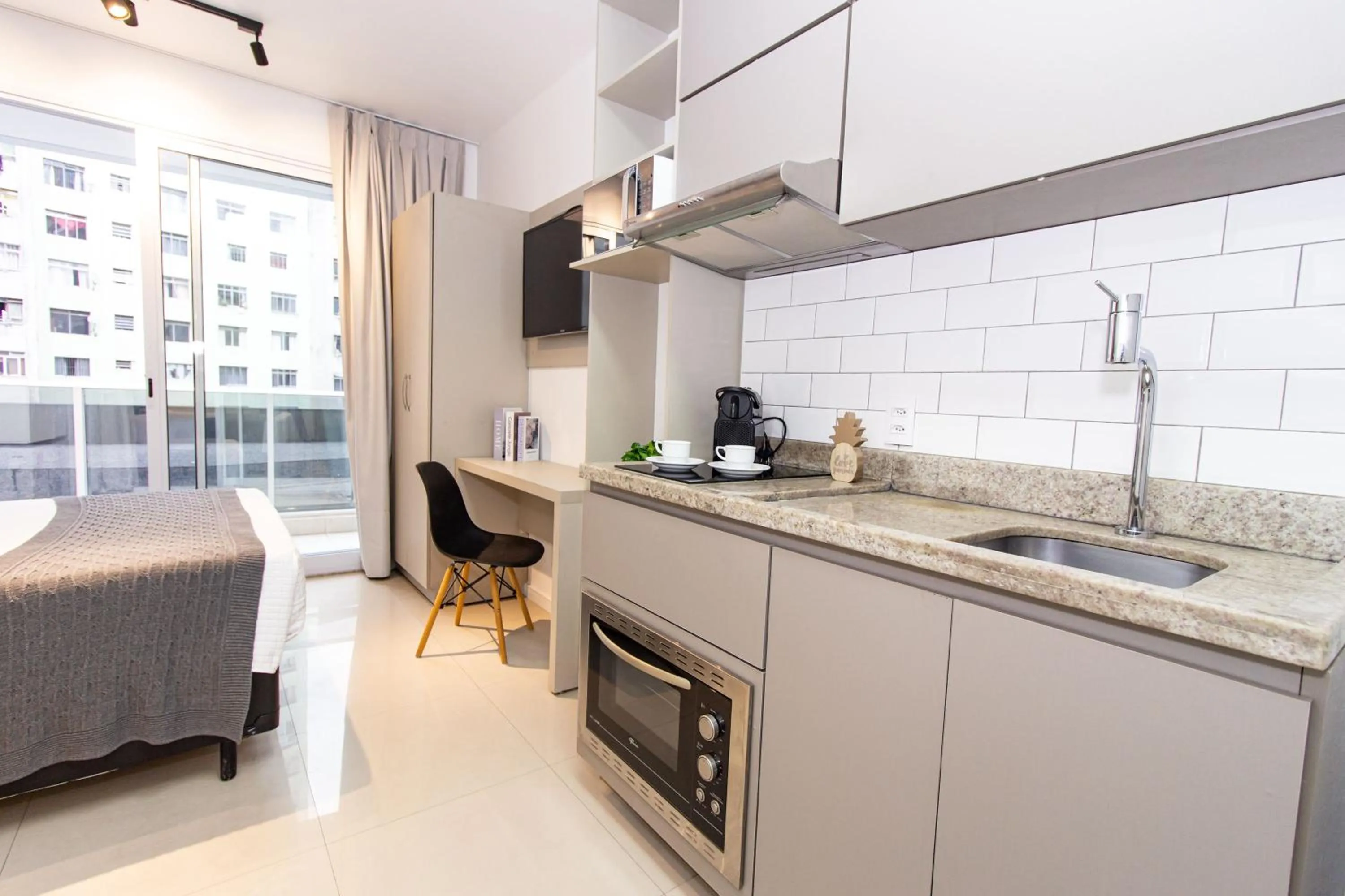 Kitchen or kitchenette in 360 Suítes Sé