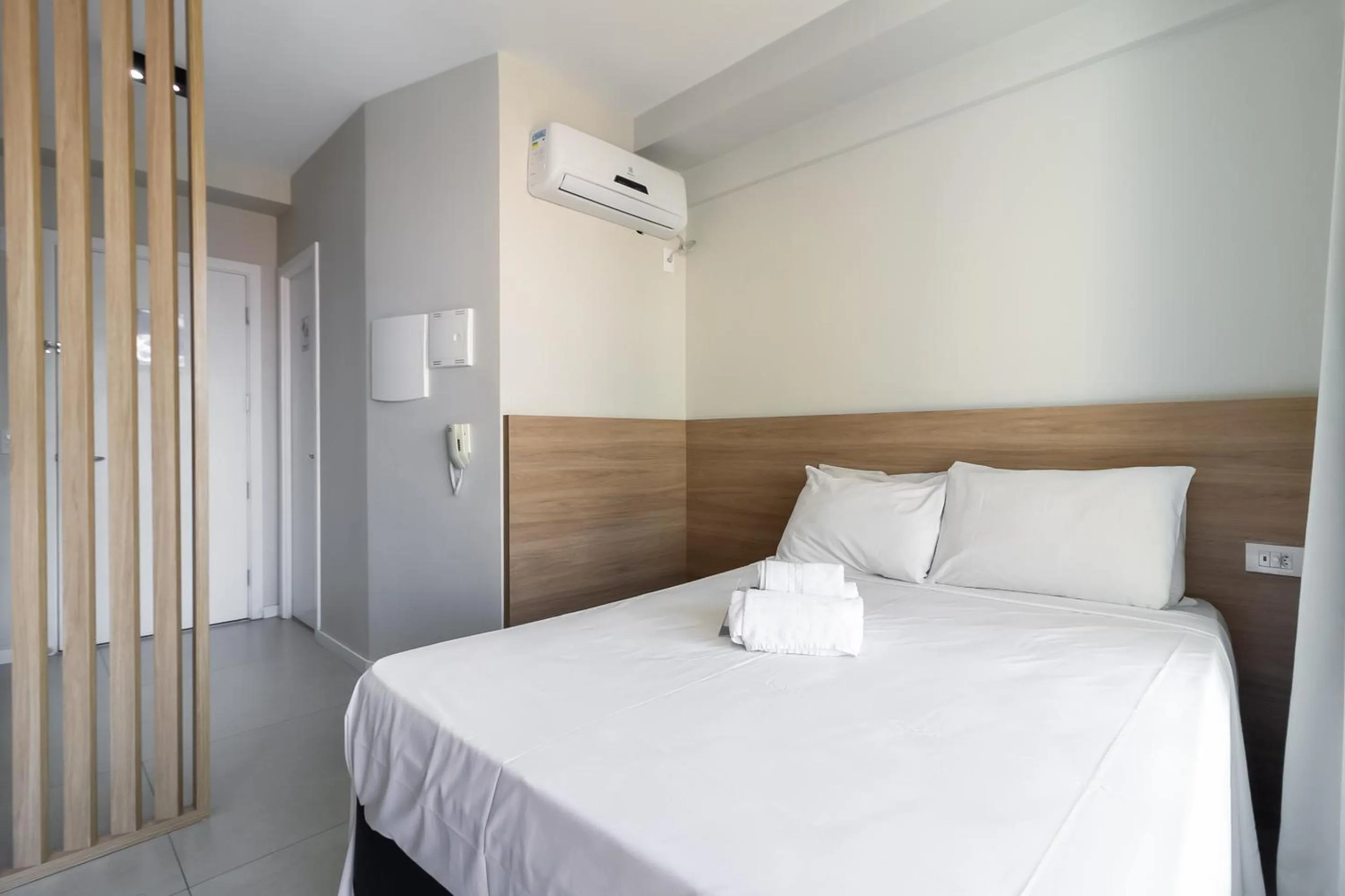 Bed in 360 Suítes Sé