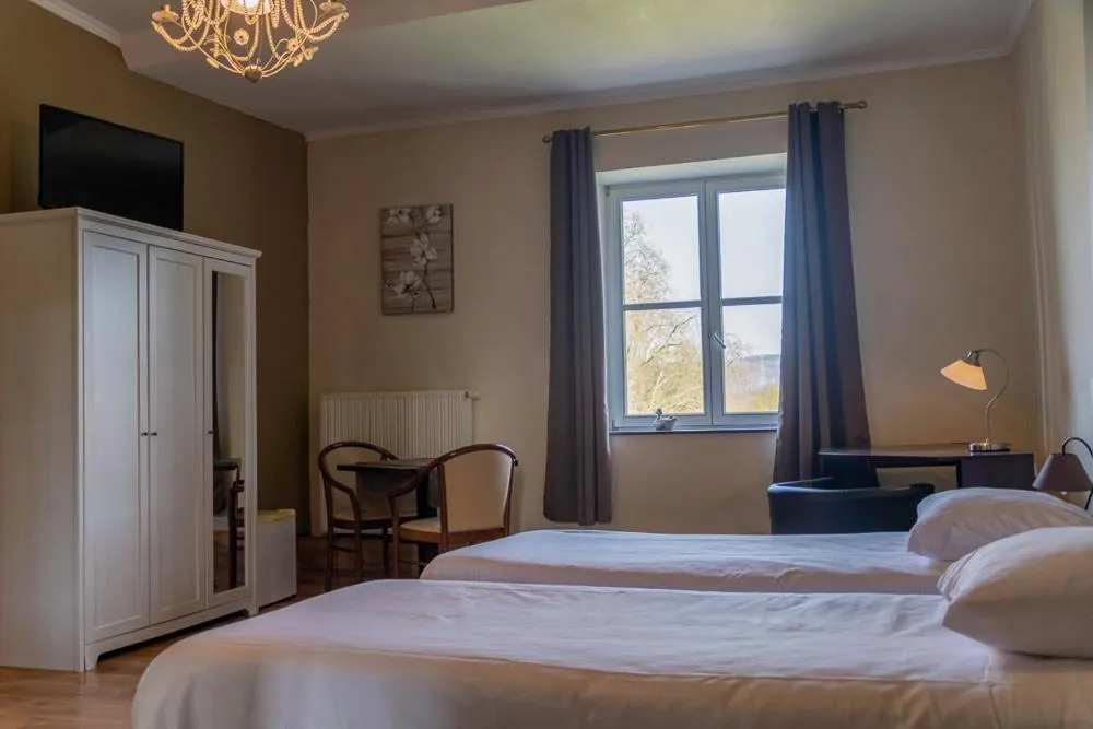 Photo of the whole room, Bed in Domaine Du Chateau De La Neuville