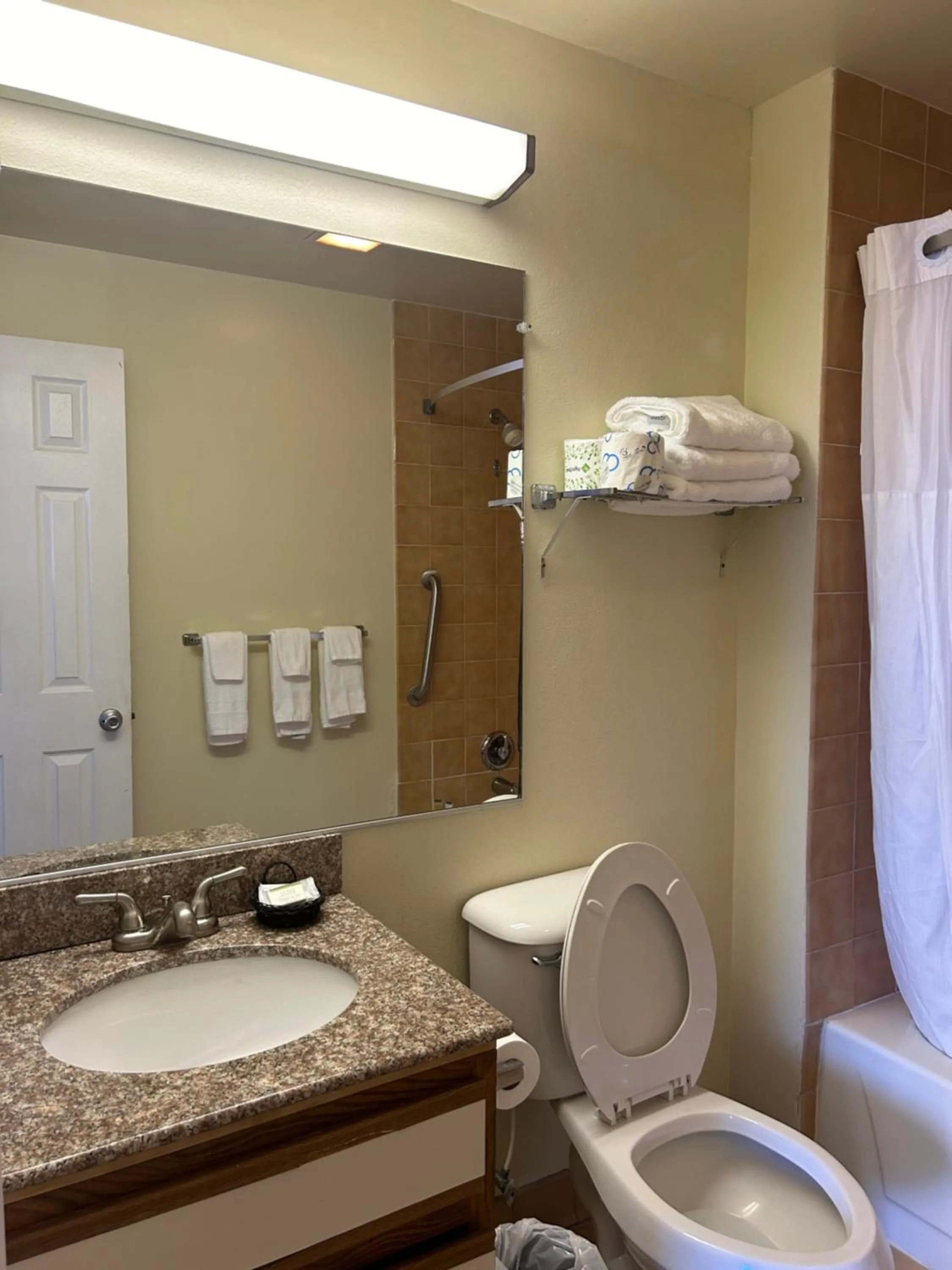 Toilet in Days Inn by Wyndham Virginia Beach At The Beach