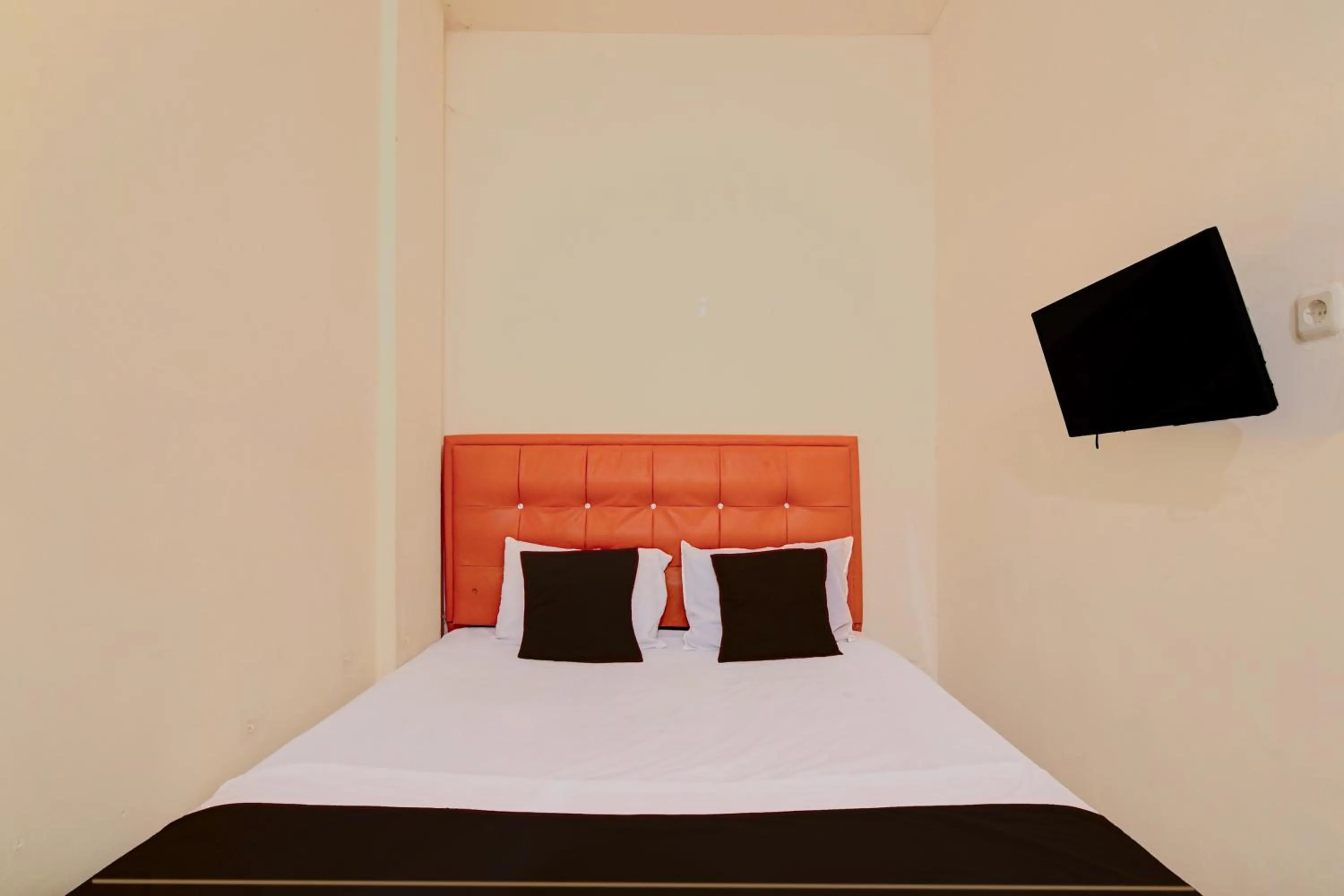 Bed in Hotel O Pekanbaru near Mall Ciputra Seraya formerly Lotus Inn