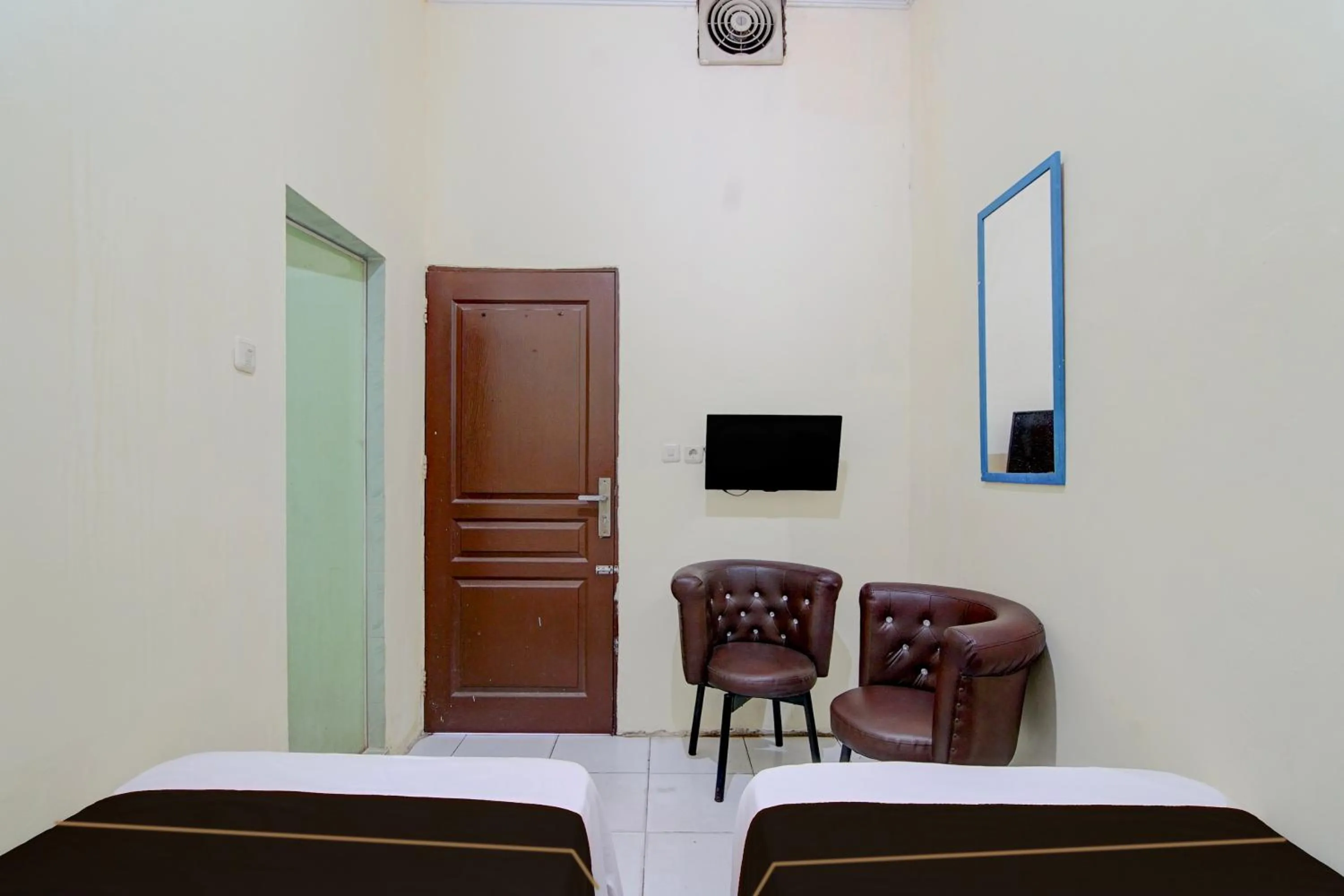 Bedroom, Bed in Hotel O Pekanbaru near Mall Ciputra Seraya formerly Lotus Inn