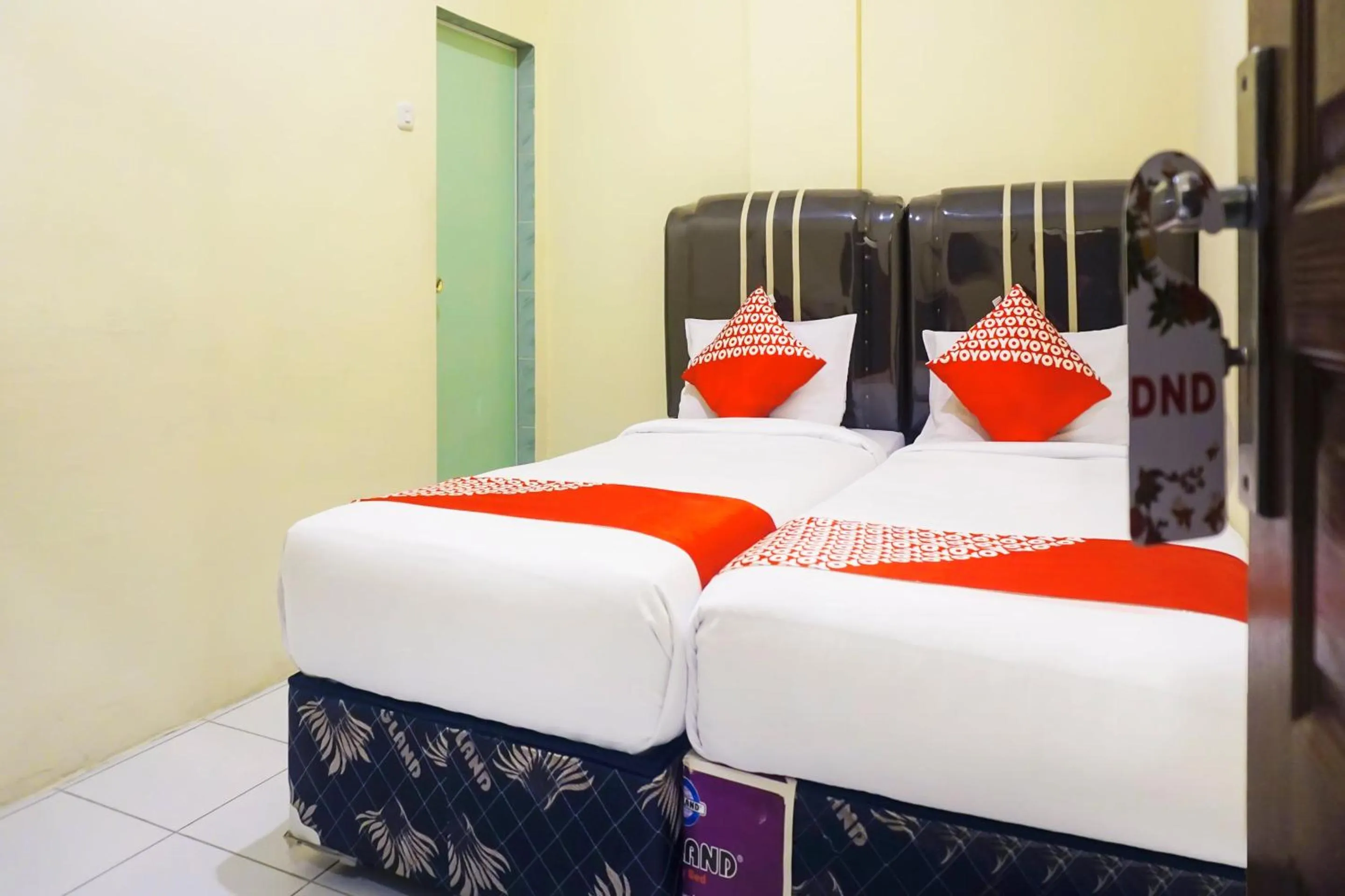 Bedroom, Bed in Hotel O Pekanbaru near Mall Ciputra Seraya formerly Lotus Inn