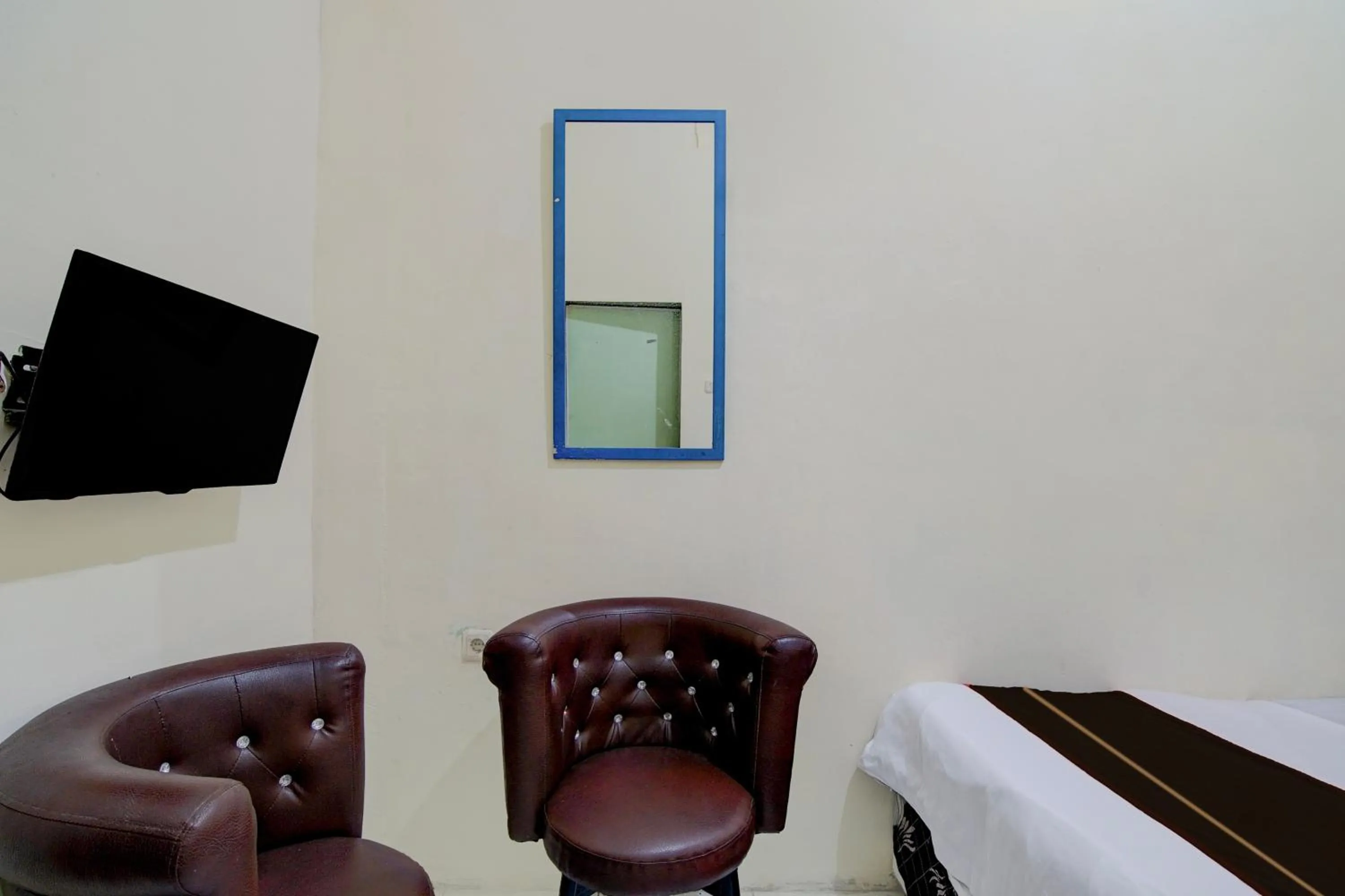 Bedroom in Hotel O Pekanbaru near Mall Ciputra Seraya formerly Lotus Inn