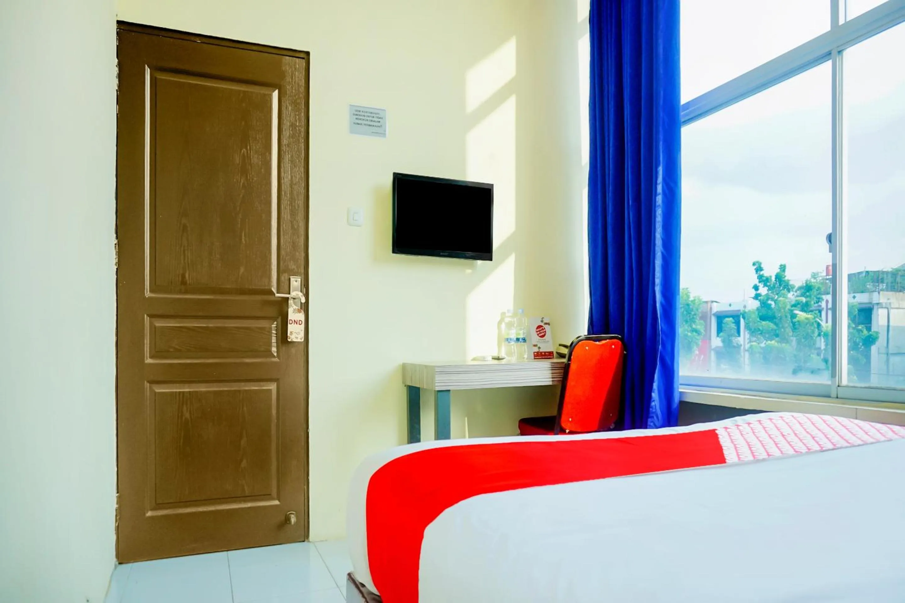 Bedroom, Bed in Hotel O Pekanbaru near Mall Ciputra Seraya formerly Lotus Inn