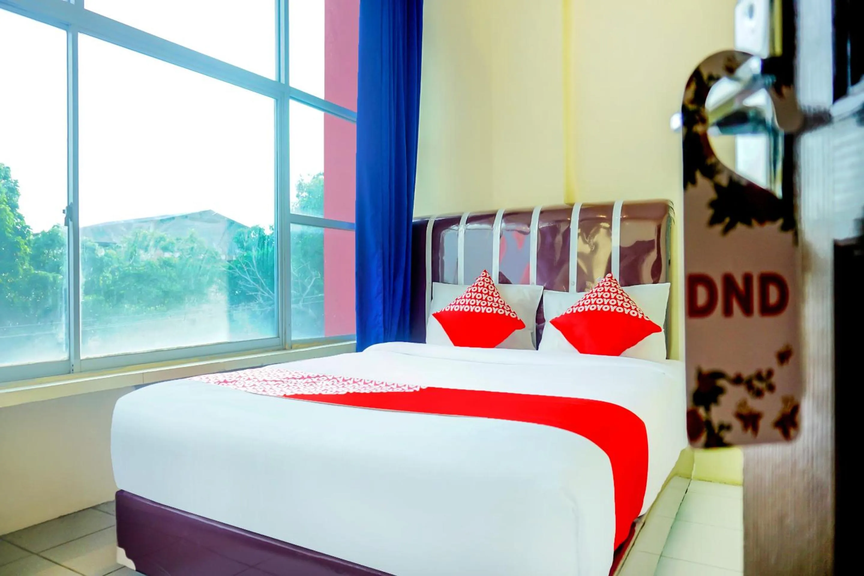 Bedroom, Bed in Hotel O Pekanbaru near Mall Ciputra Seraya formerly Lotus Inn