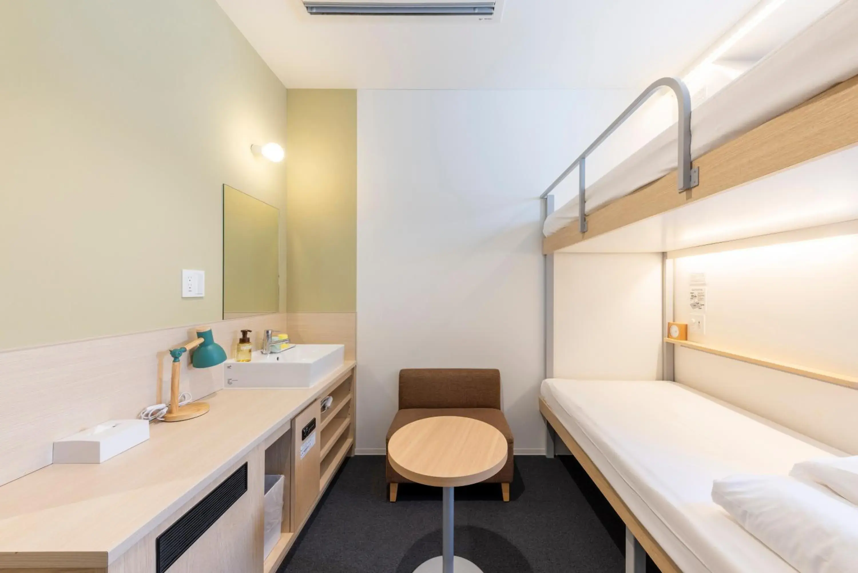 Photo of the whole room, Bed in WeBase Hiroshima Photo of the whole room, Bed in WeBase Hiroshima