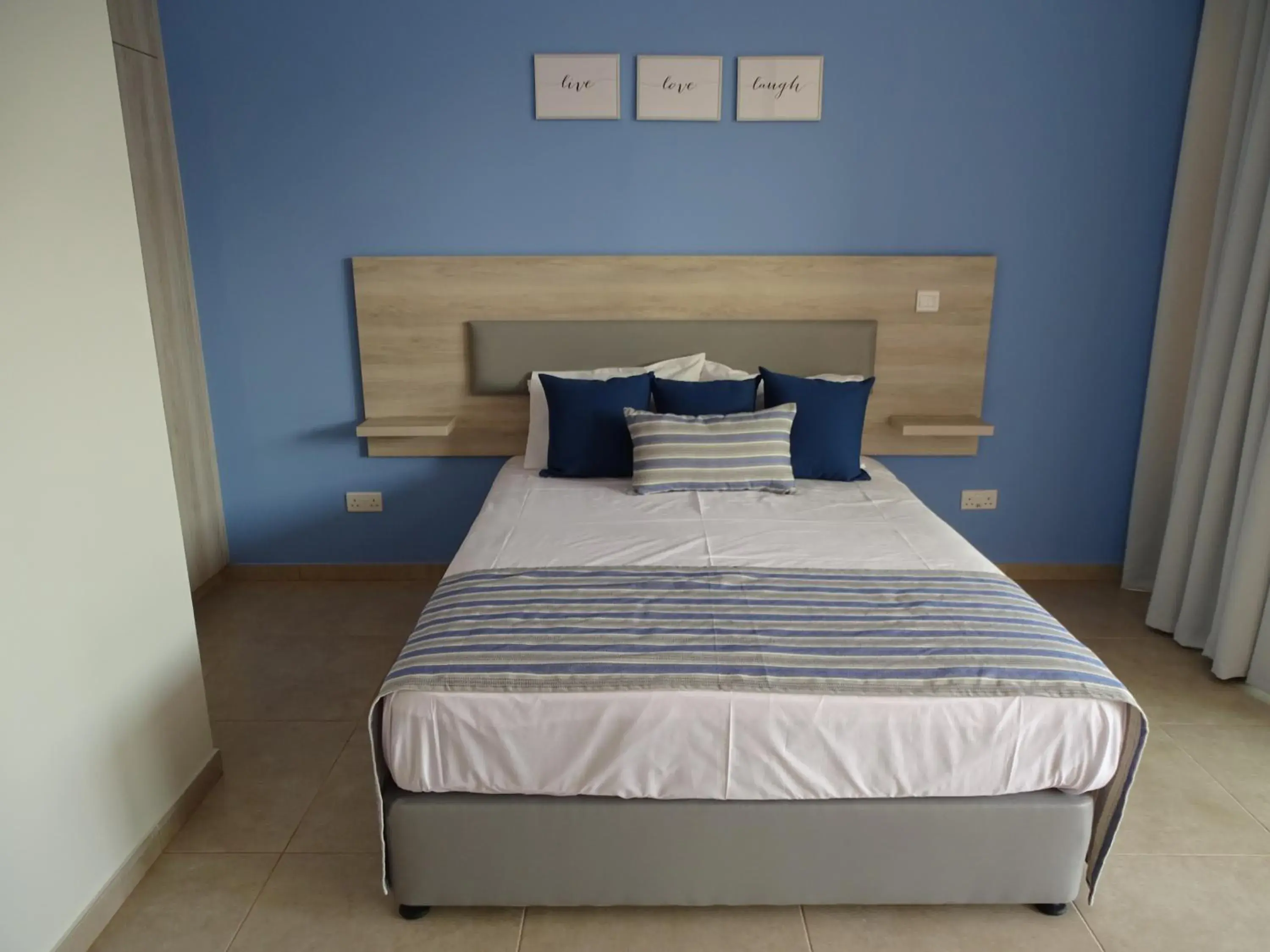 Bed in Proteas Mare Suites Bed in Proteas Mare Suites