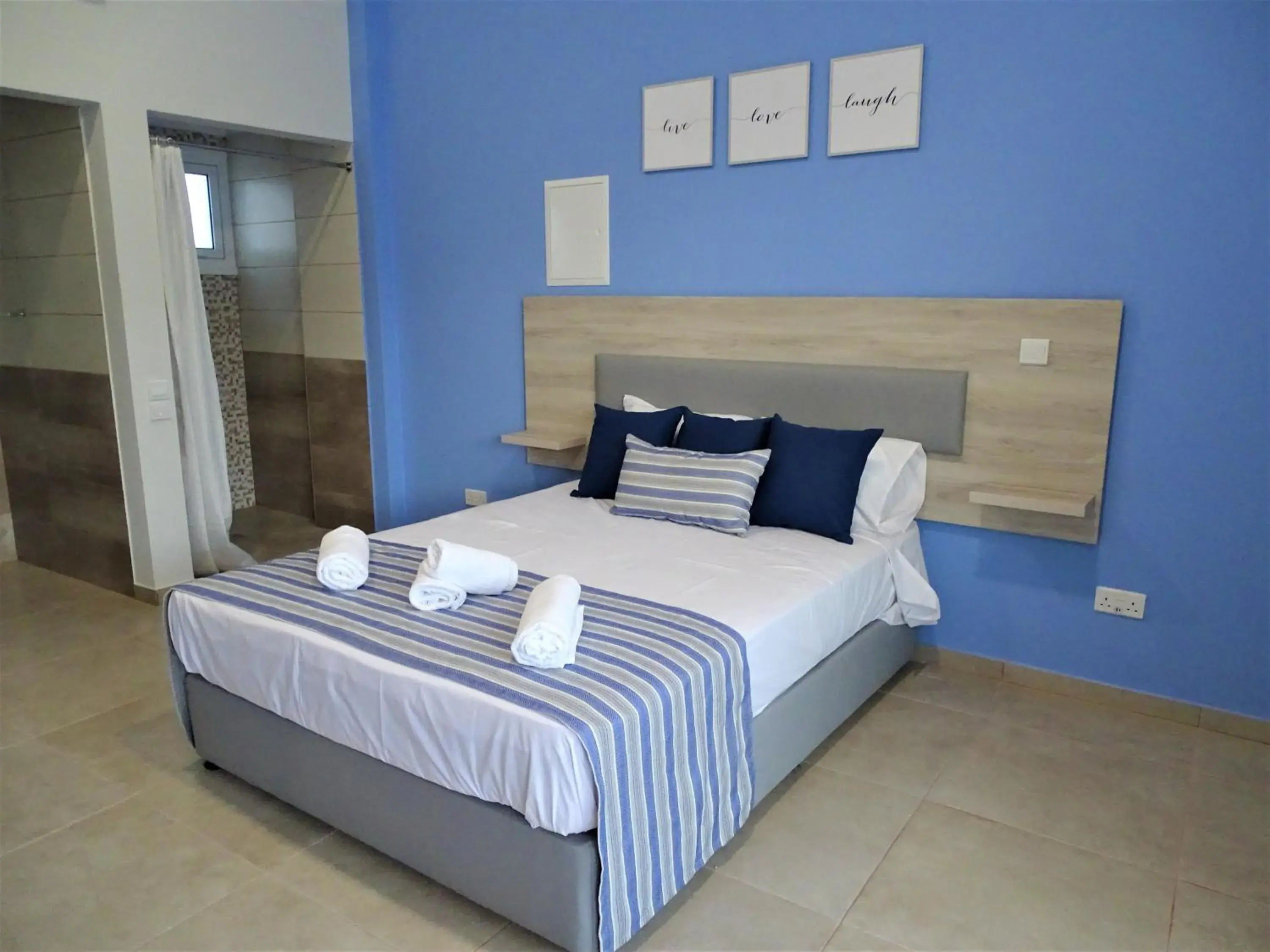 Bed in Proteas Mare Suites Bed in Proteas Mare Suites