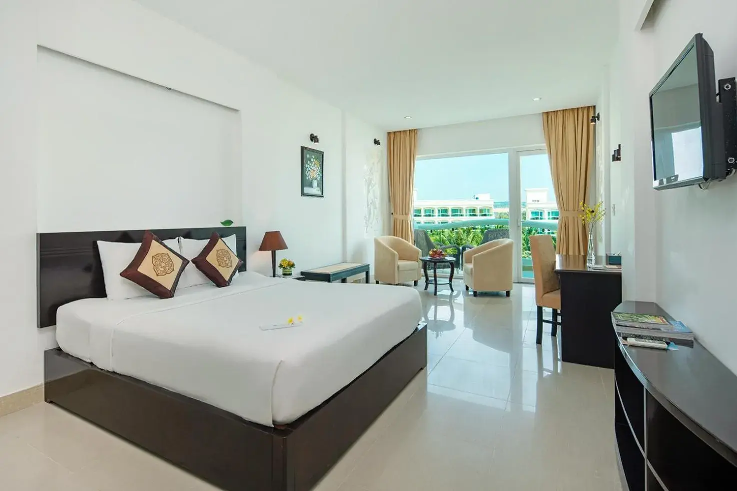 Bed in The Sailing Bay Beach Resort Bed in The Sailing Bay Beach Resort