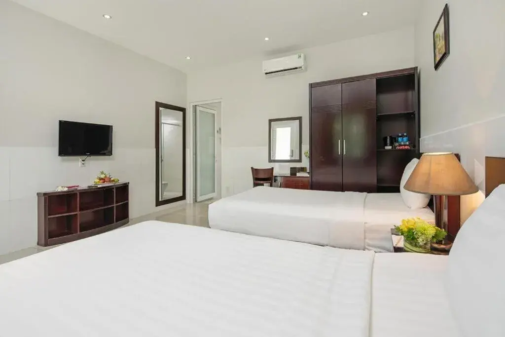 Bed in The Sailing Bay Beach Resort Bed in The Sailing Bay Beach Resort
