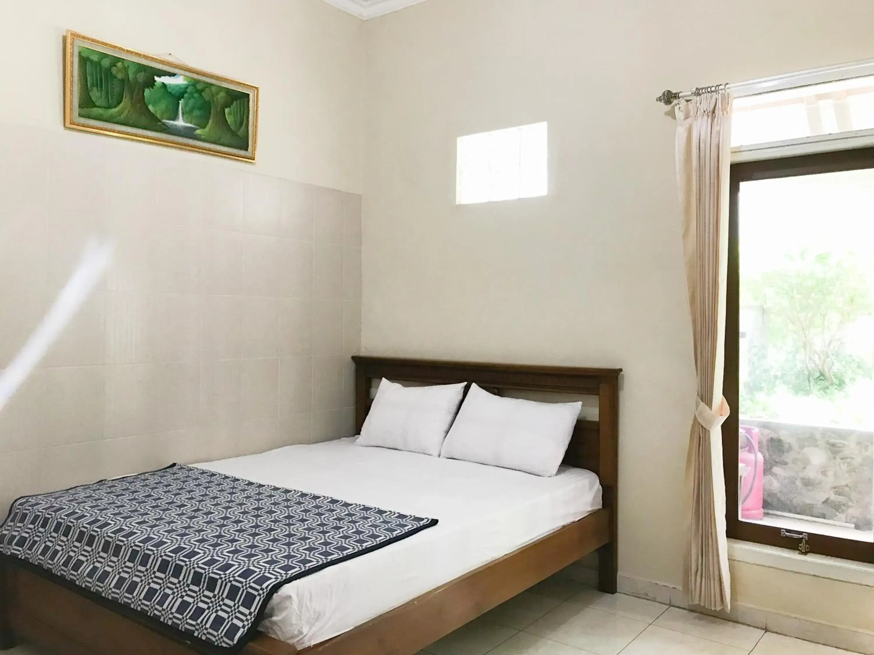 Bedroom, Bed in Villa Bunga Guest House RedPartner Bedroom, Bed in Villa Bunga Guest House RedPartner