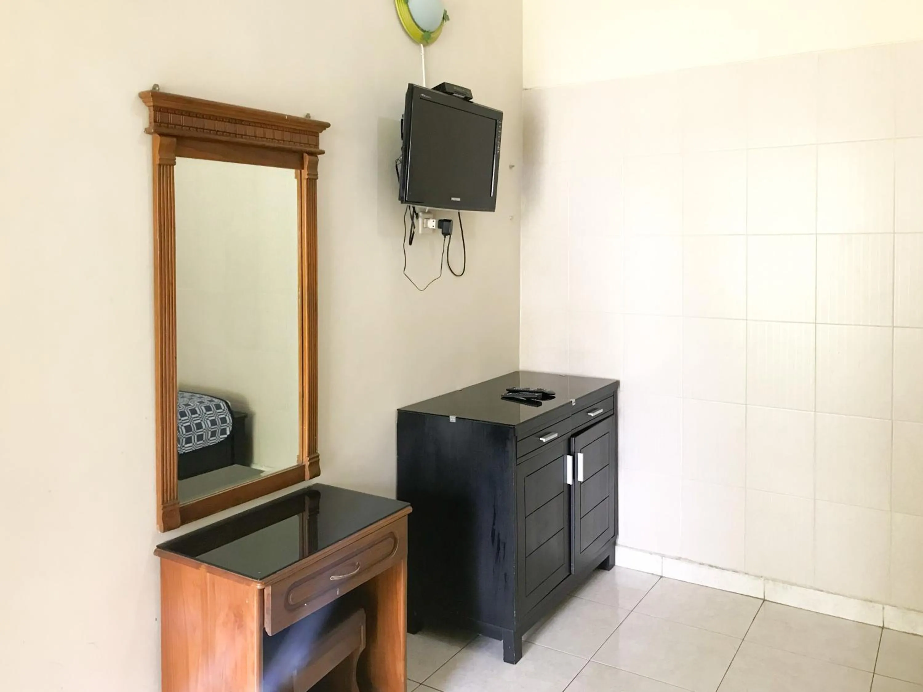 TV and multimedia in Villa Bunga Guest House RedPartner