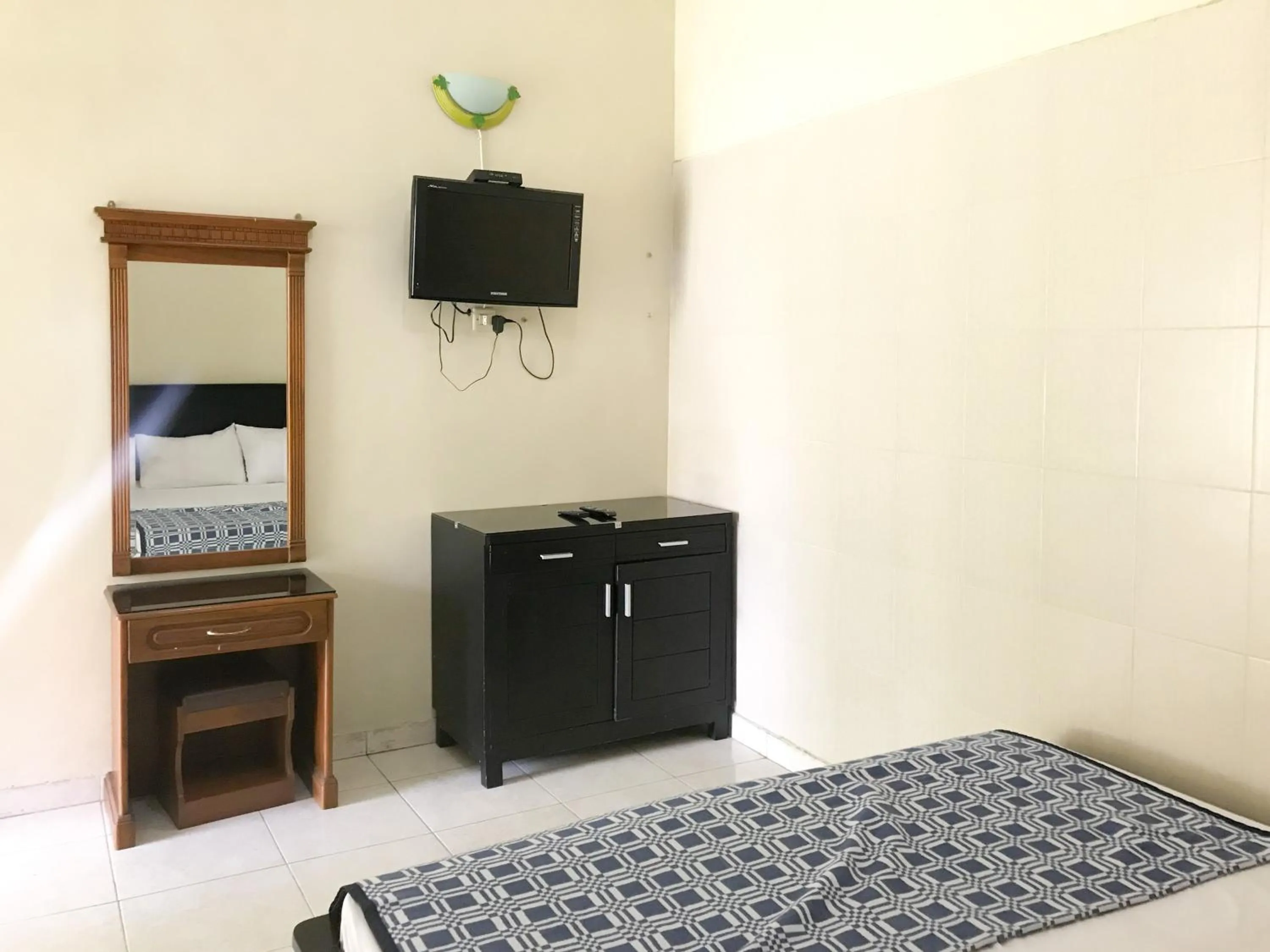 TV and multimedia in Villa Bunga Guest House RedPartner