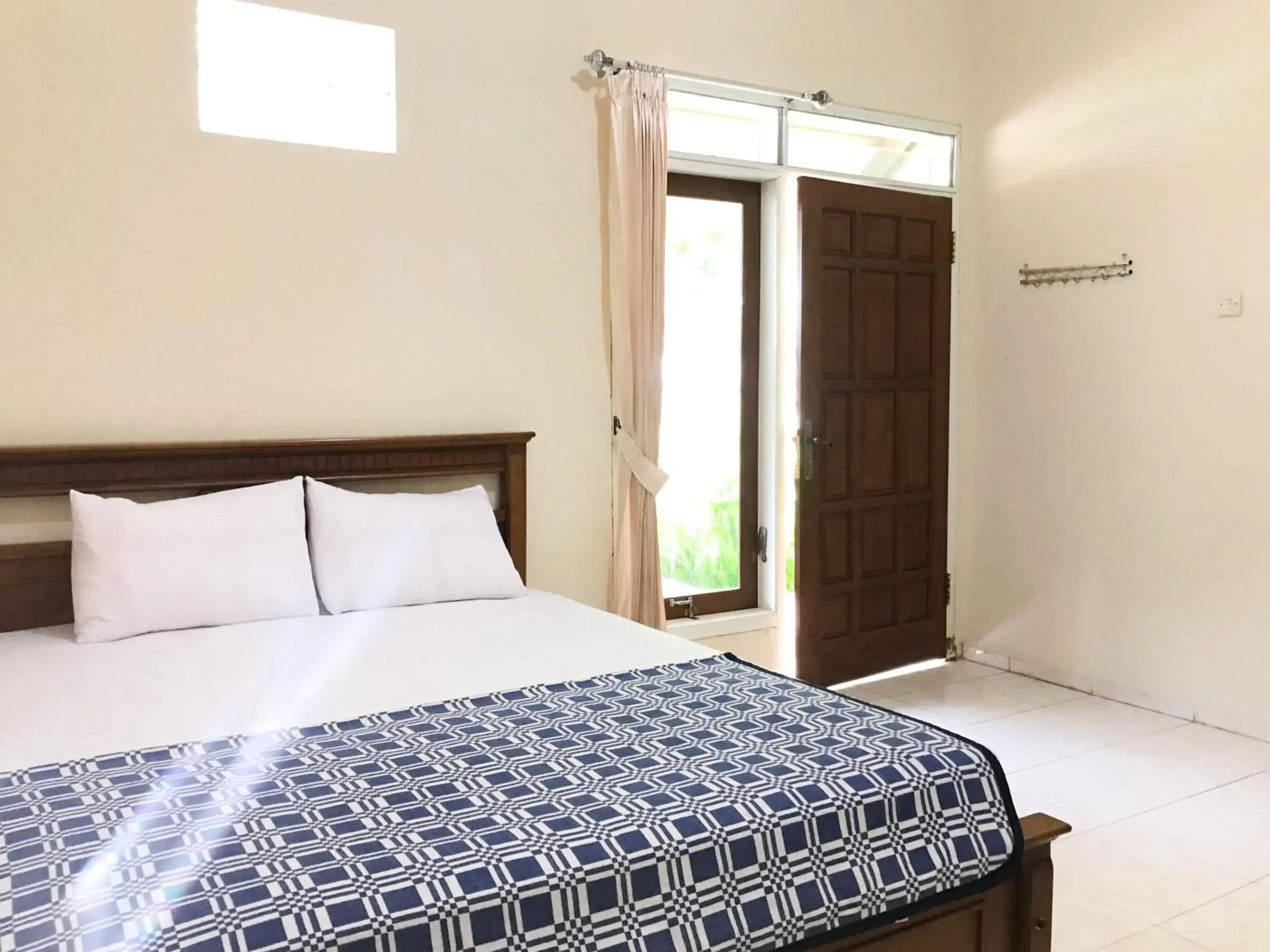 Bedroom, Bed in Villa Bunga Guest House RedPartner Bedroom, Bed in Villa Bunga Guest House RedPartner