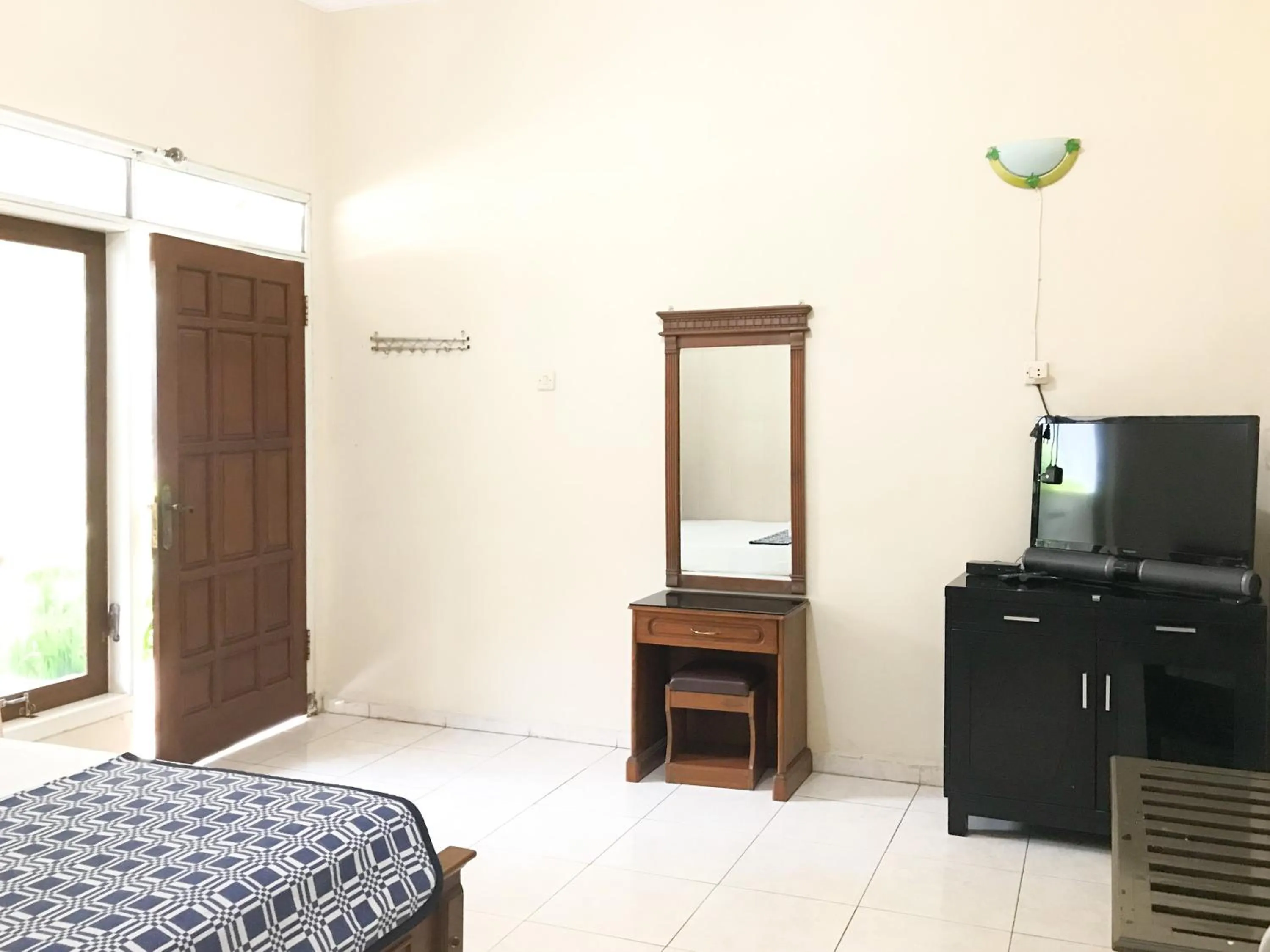 Bedroom, Bed in Villa Bunga Guest House RedPartner