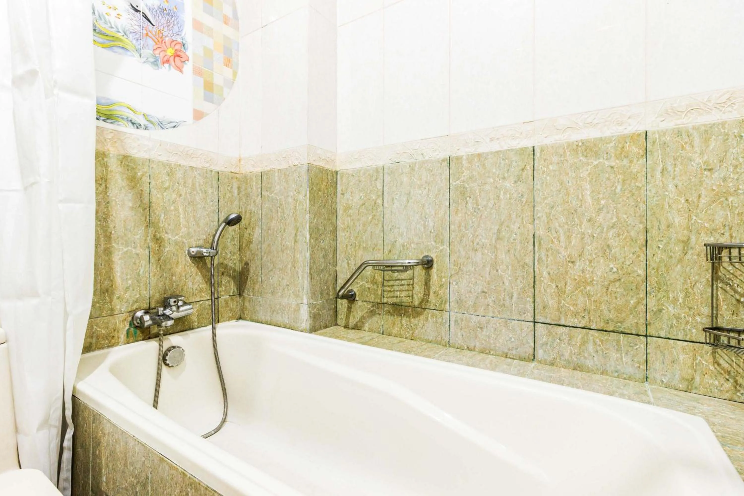 Bathroom in RedDoorz Plus near Pantai Malalayang Manado