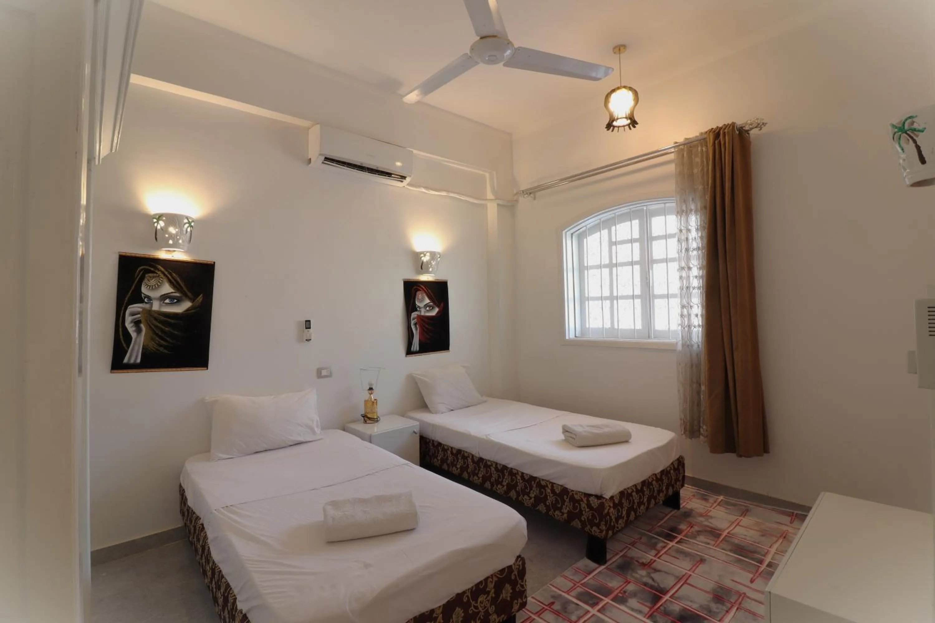 Bed in Mama Africa Apts & Studios