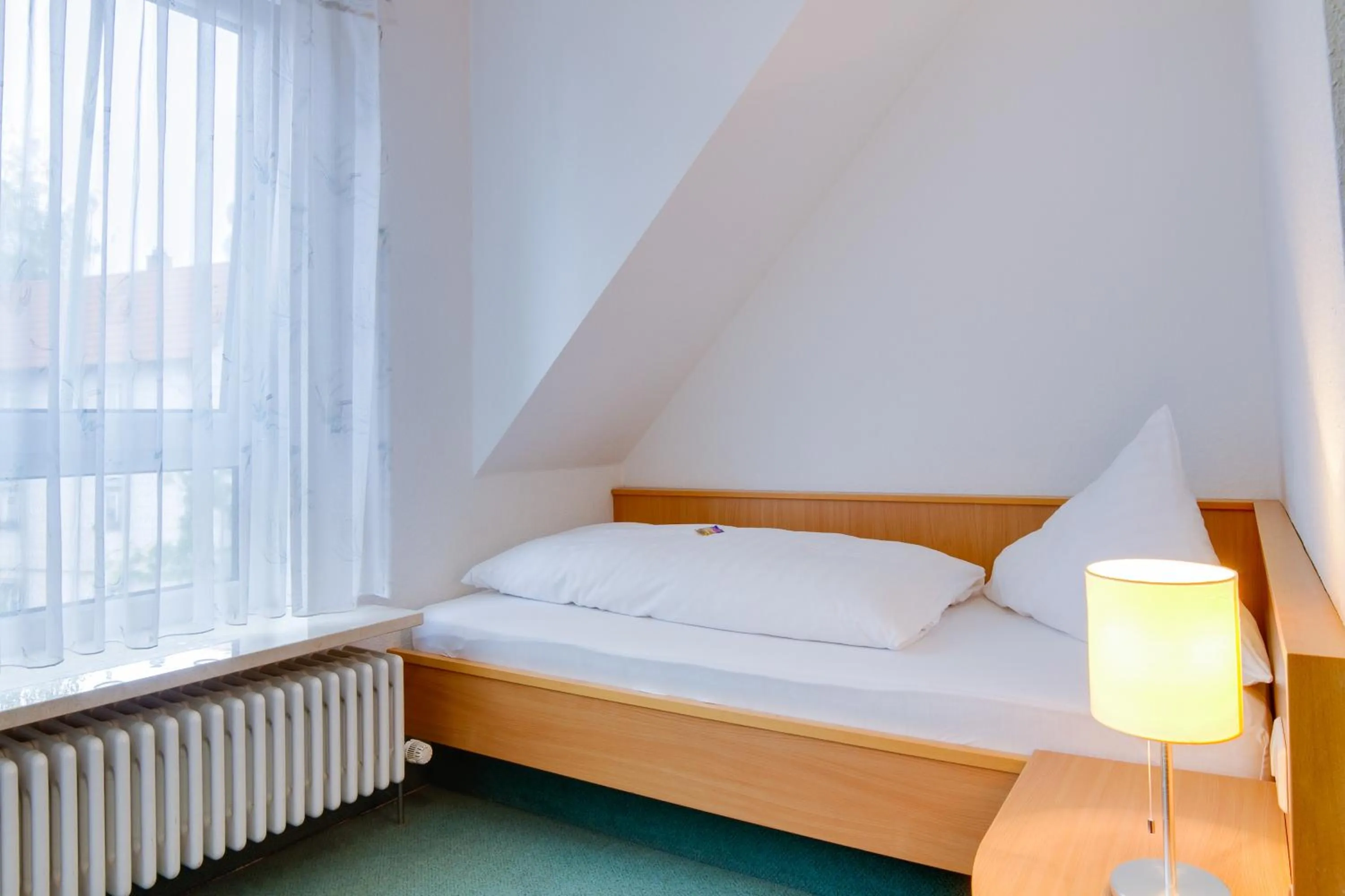 Bed in Central Hotel Friedrichshafen