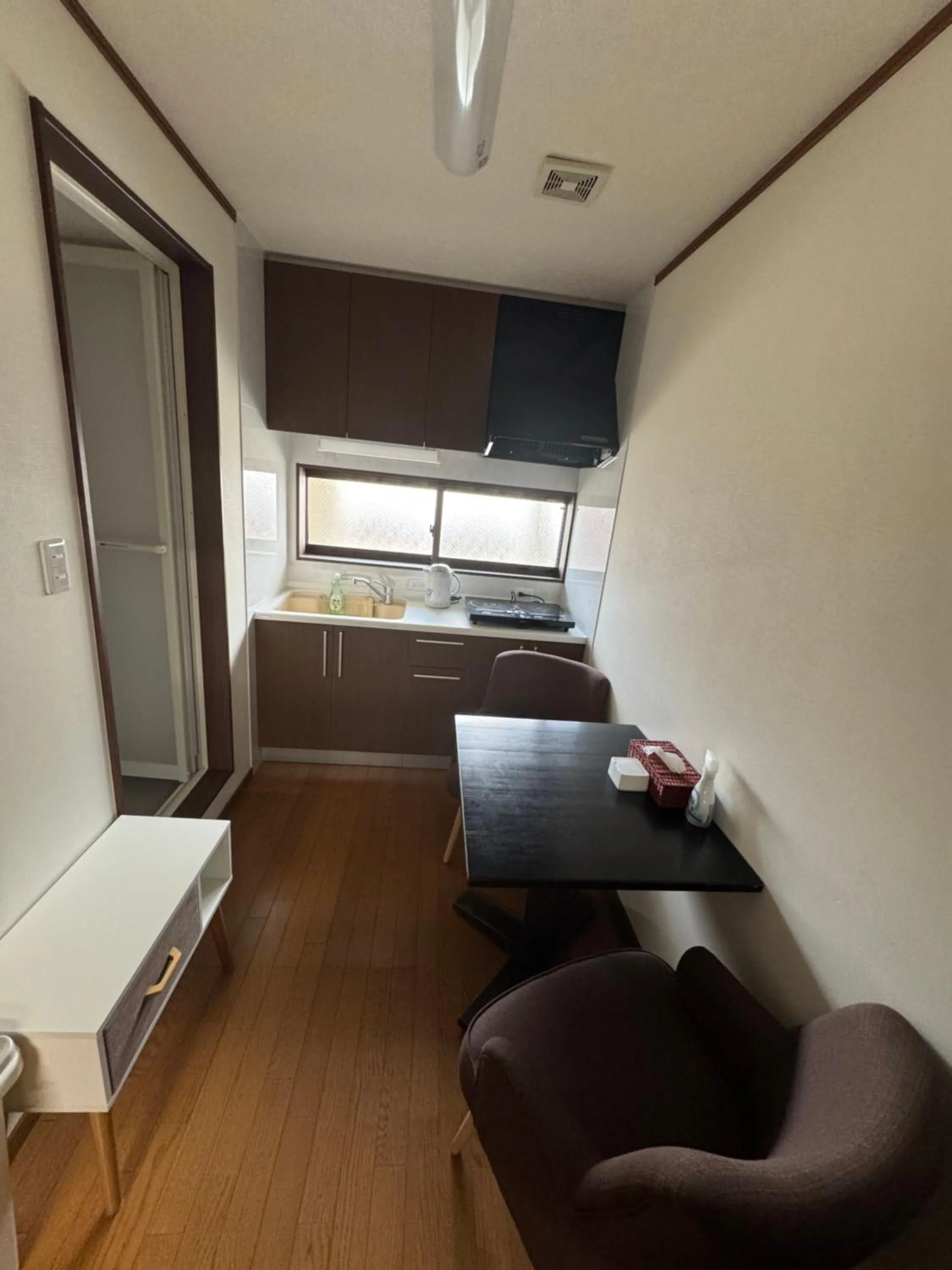 Kitchen or kitchenette in Thanyaporn Hotel