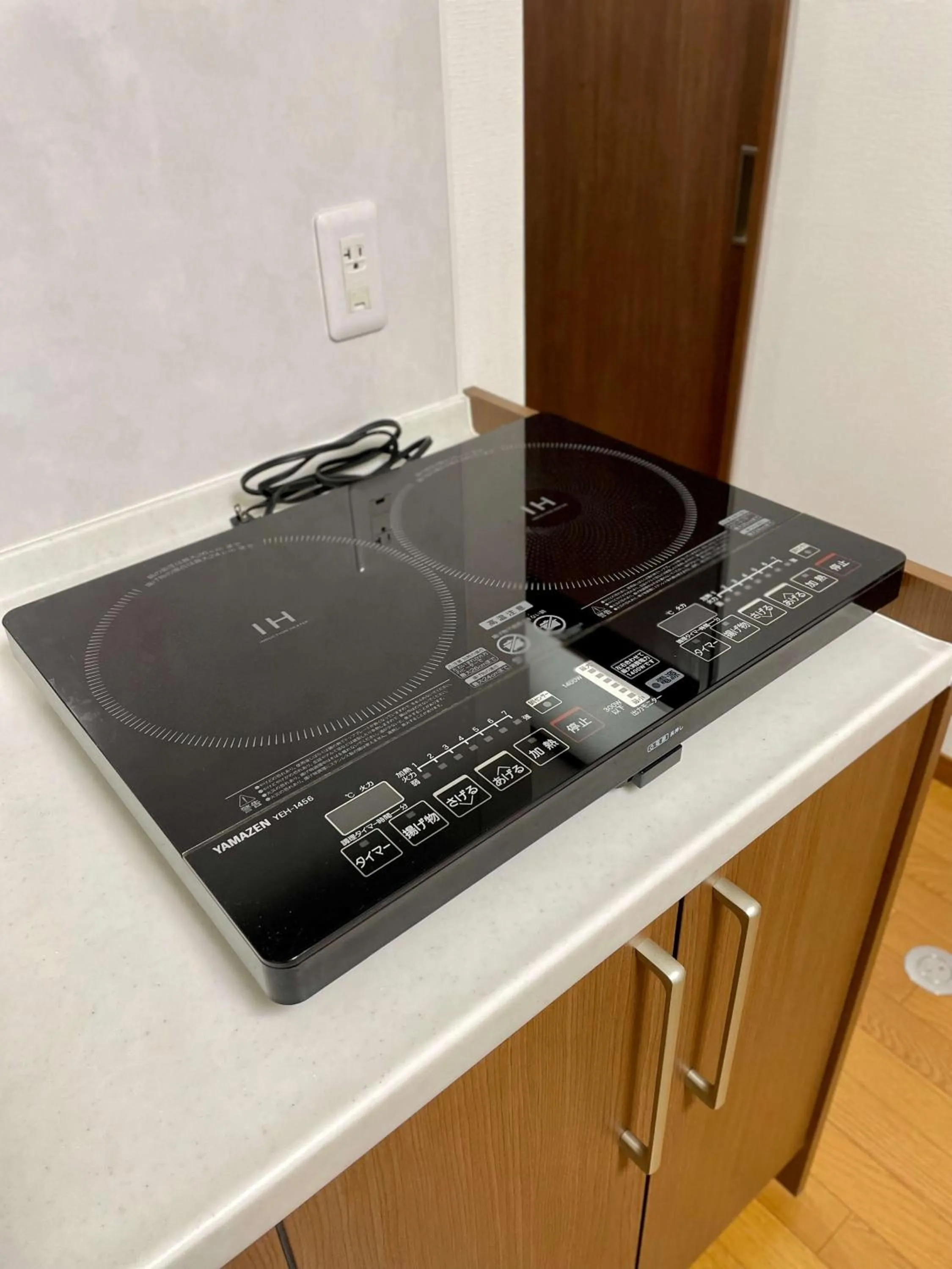 Kitchen or kitchenette in Thanyaporn Hotel