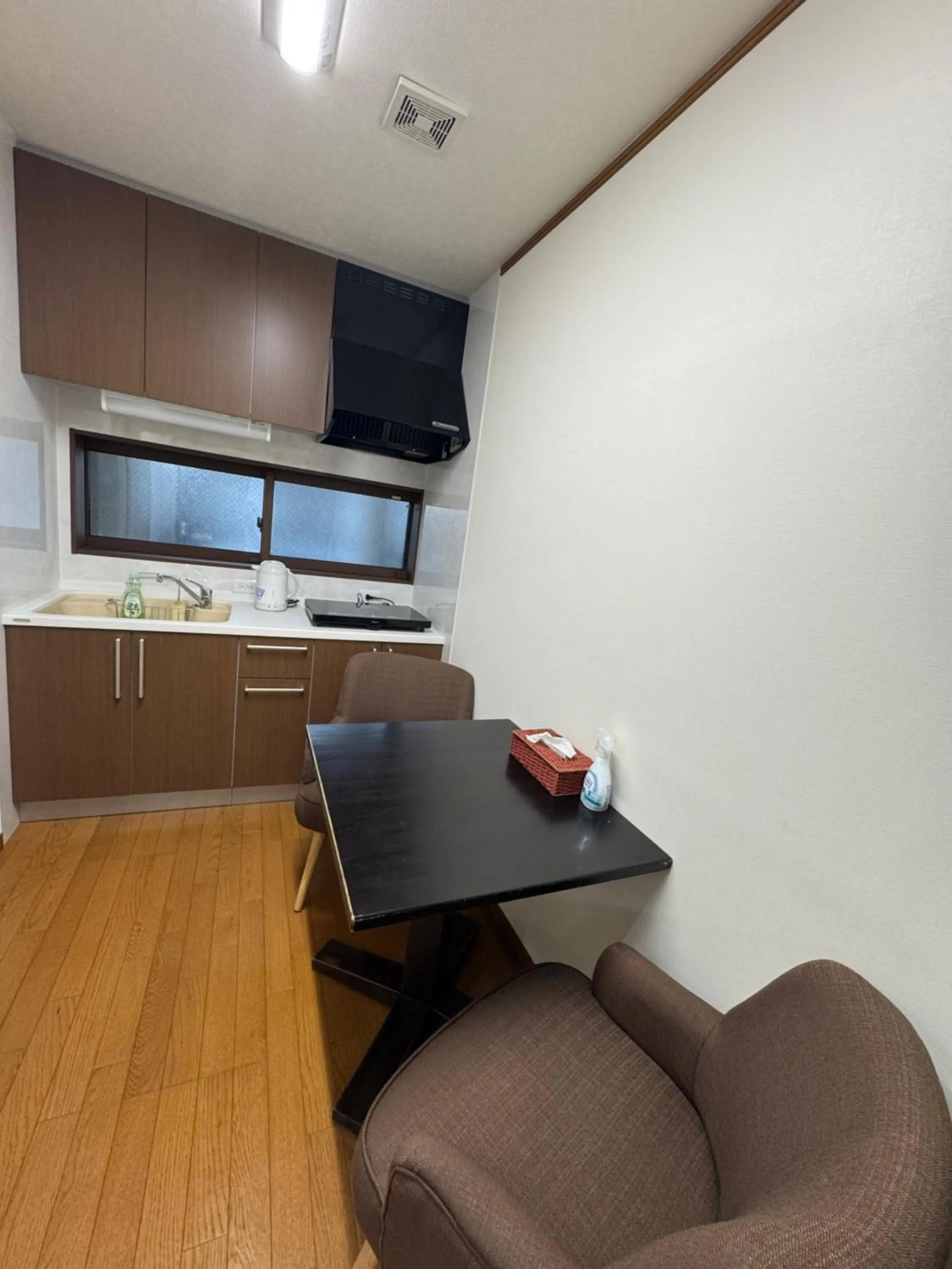 Kitchen or kitchenette in Thanyaporn Hotel