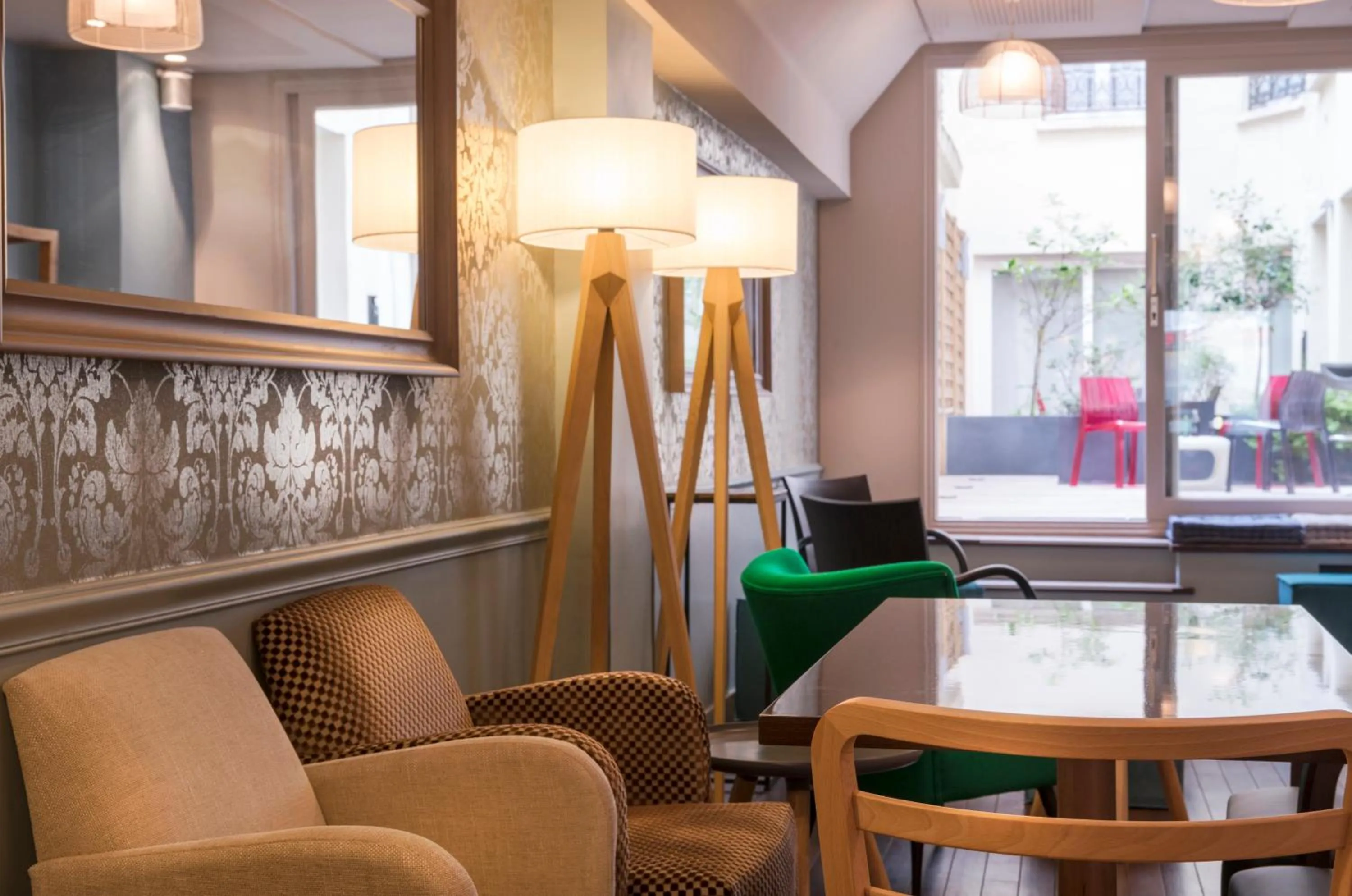 Seating area in Hotel Magenta 38 by Happyculture