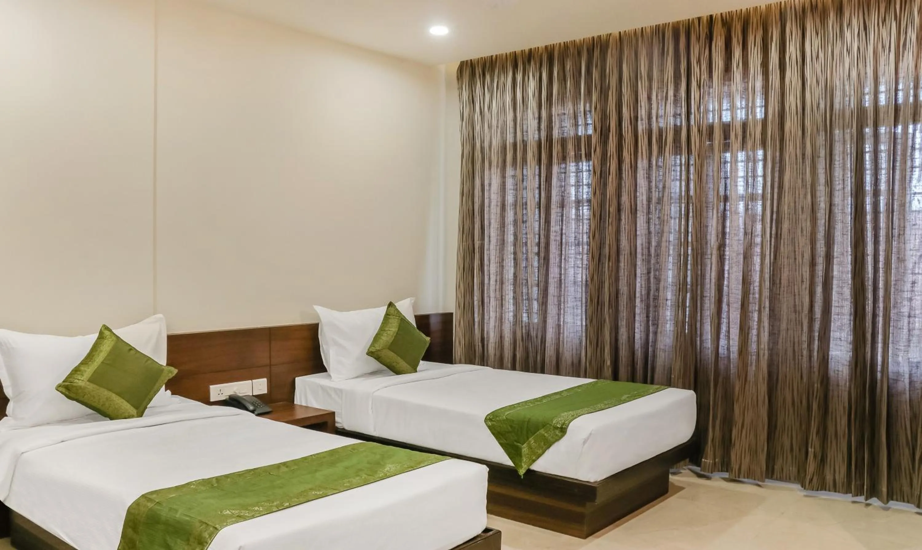 Bedroom, Bed in Treebo Casino