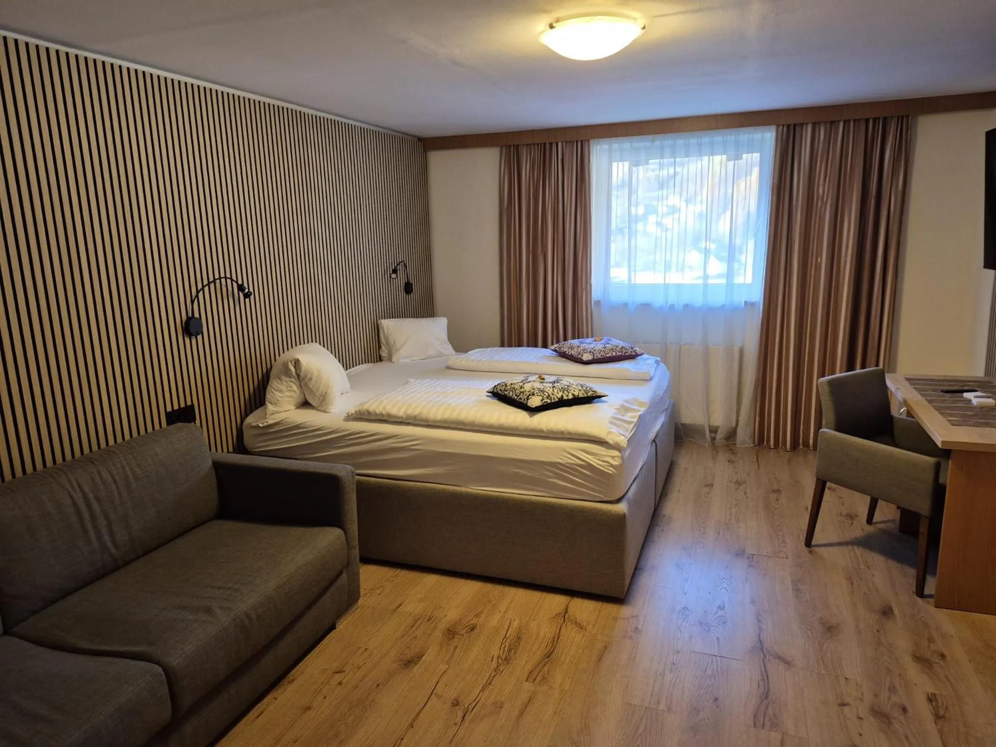 Photo of the whole room, Bed in Sporthotel Mölltal