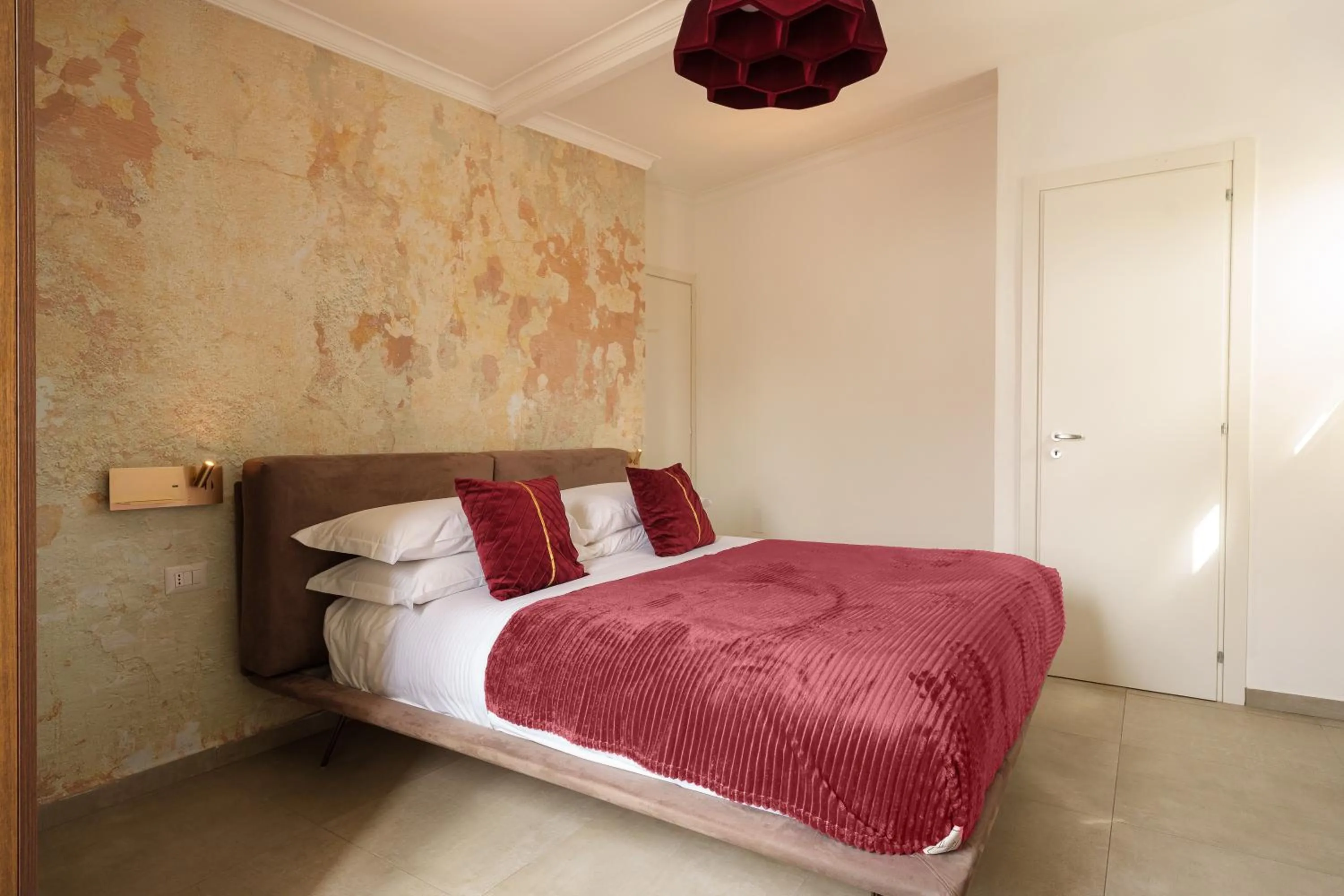 Bed in Ortigia Boutique Palace