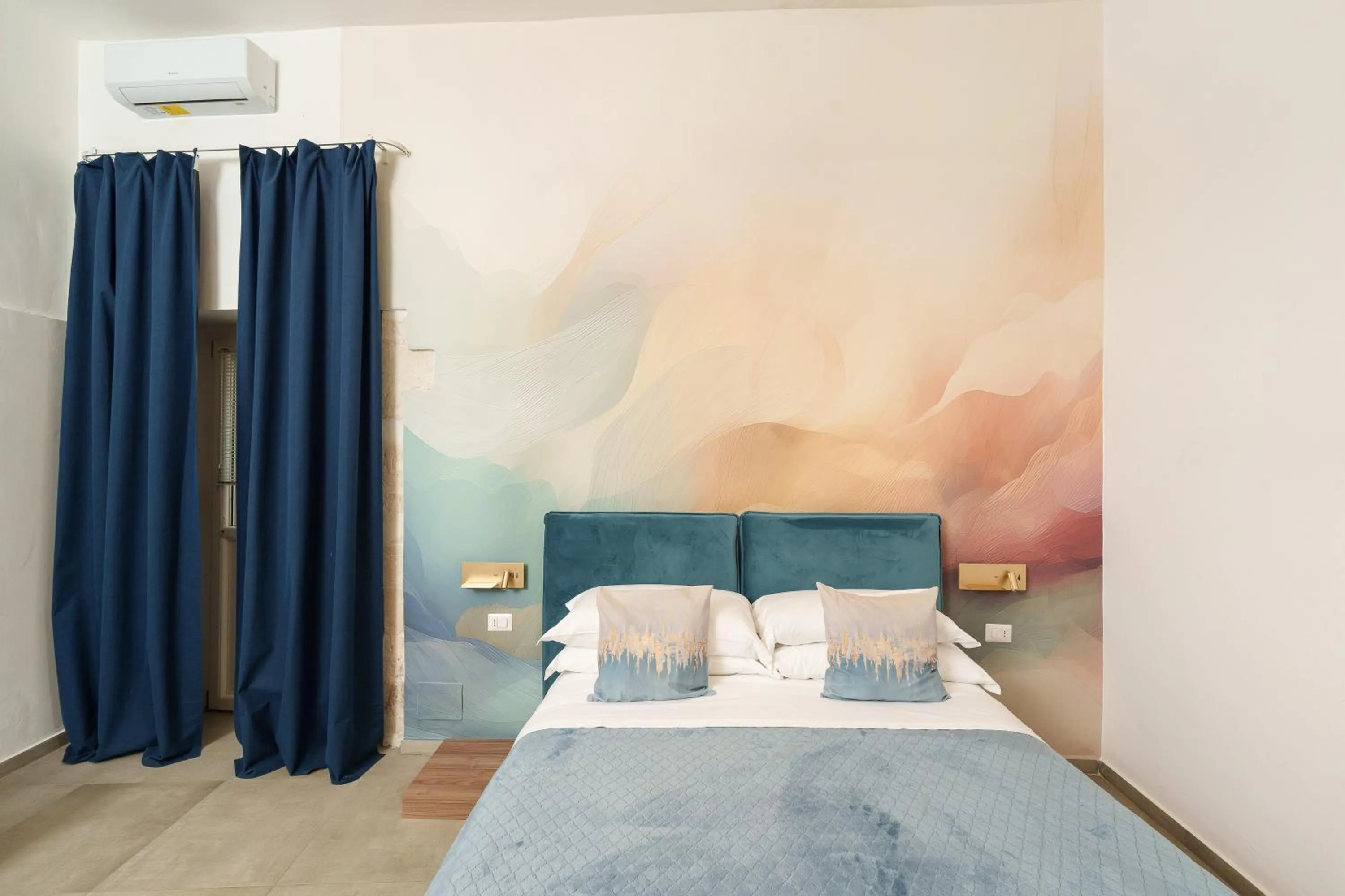 Bed in Ortigia Boutique Palace