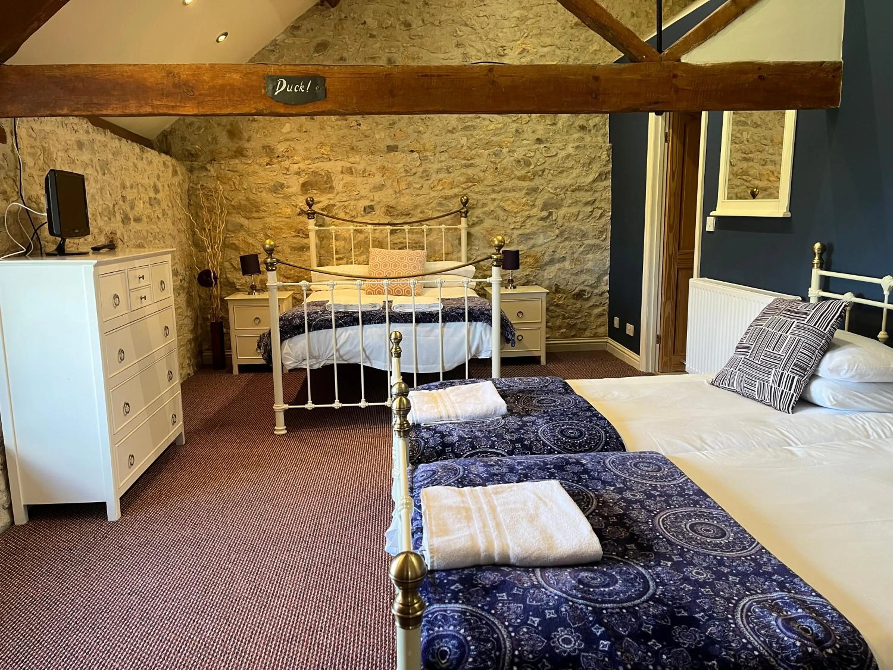 Bed in Hills Farm Stays