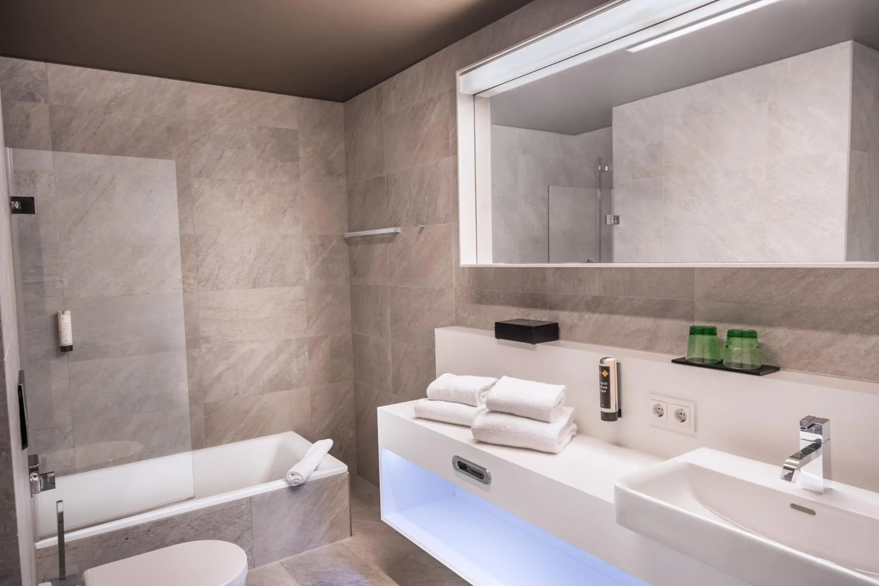 Bathroom in ADLERS Hotel Innsbruck Bathroom in ADLERS Hotel Innsbruck