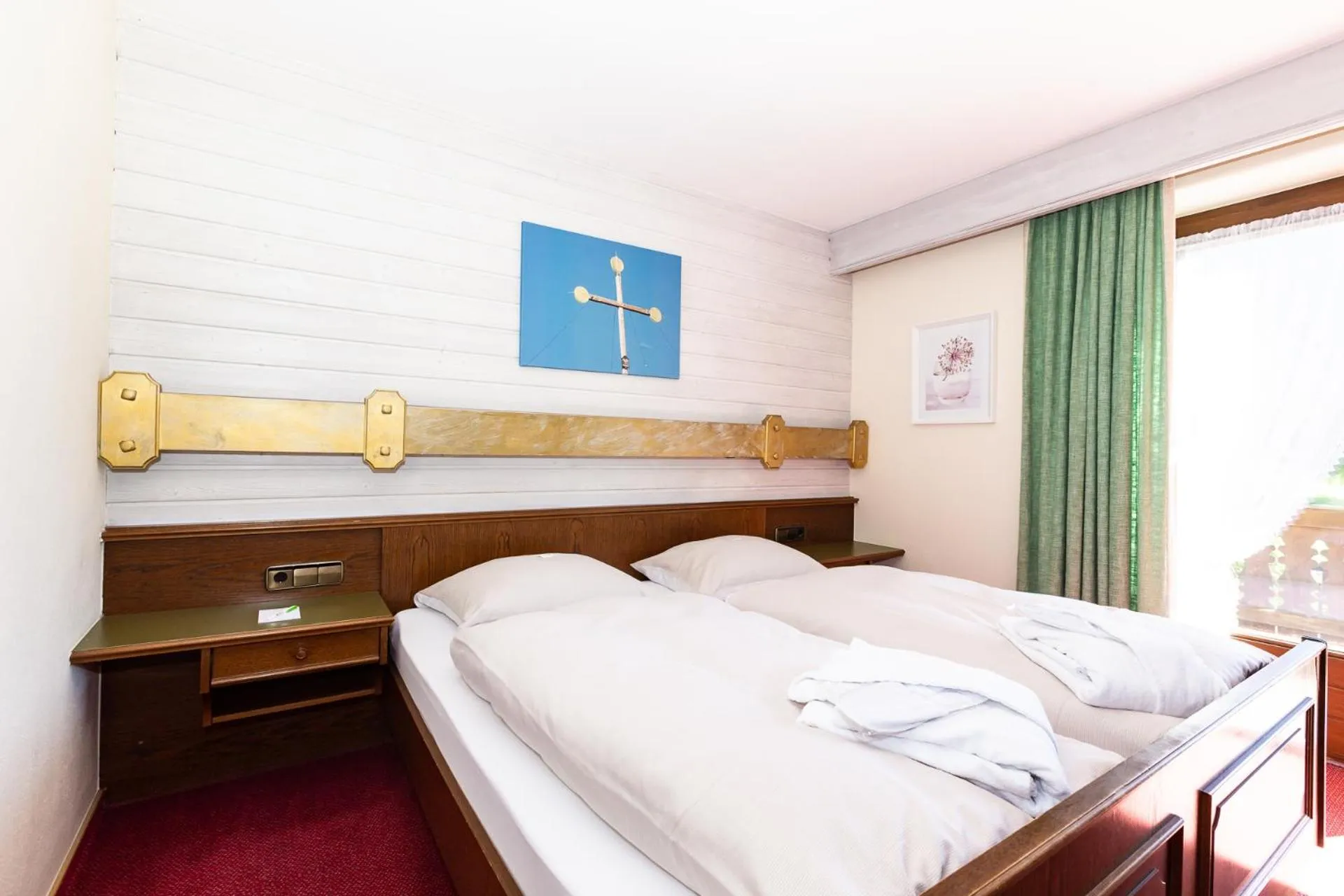 Photo of the whole room, Bed in DEVA Hotel-Restaurant Fischerwirt inklusive Chiemgau Card