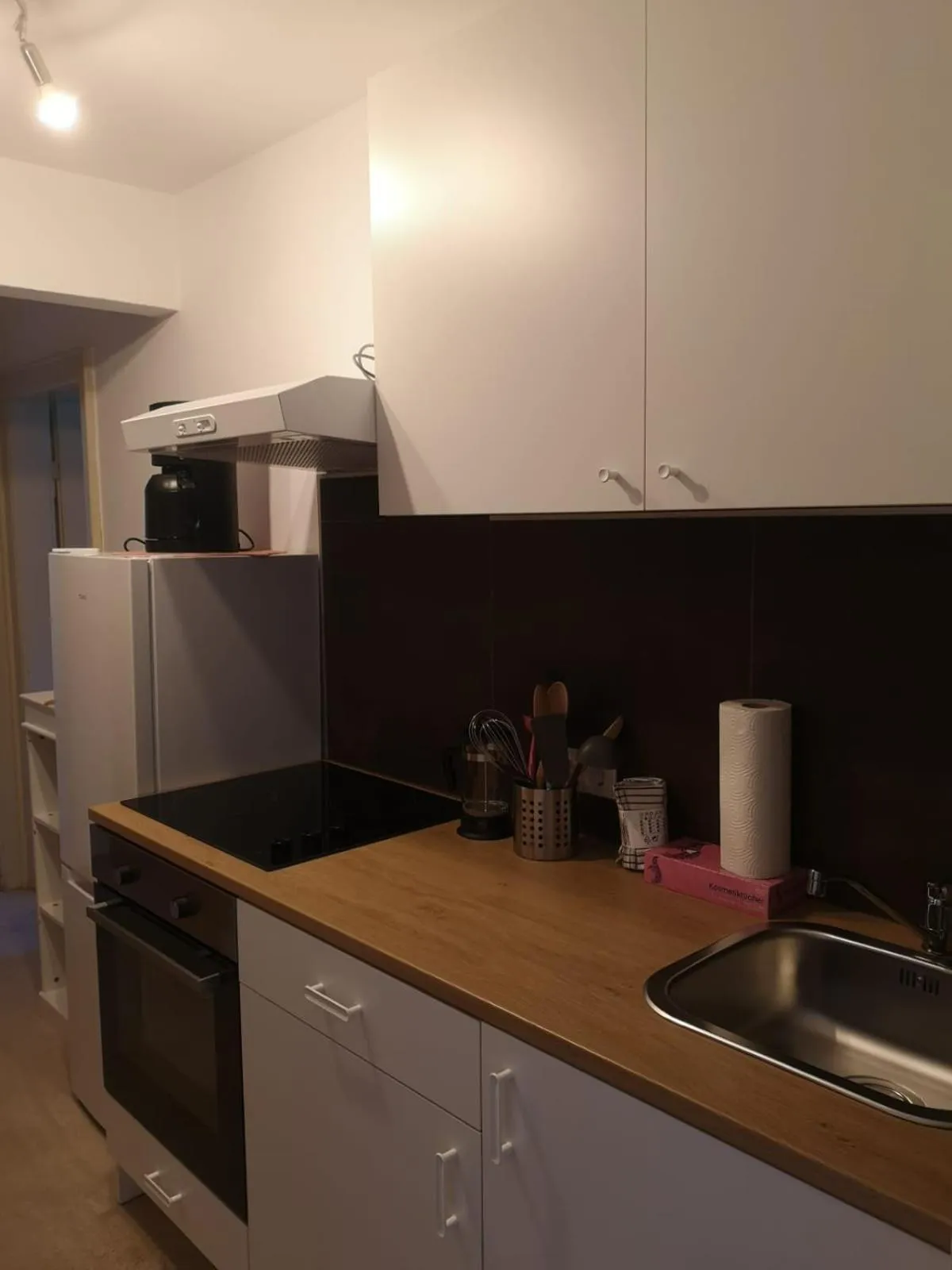 Kitchen or kitchenette in DEVA Hotel-Restaurant Fischerwirt inklusive Chiemgau Card