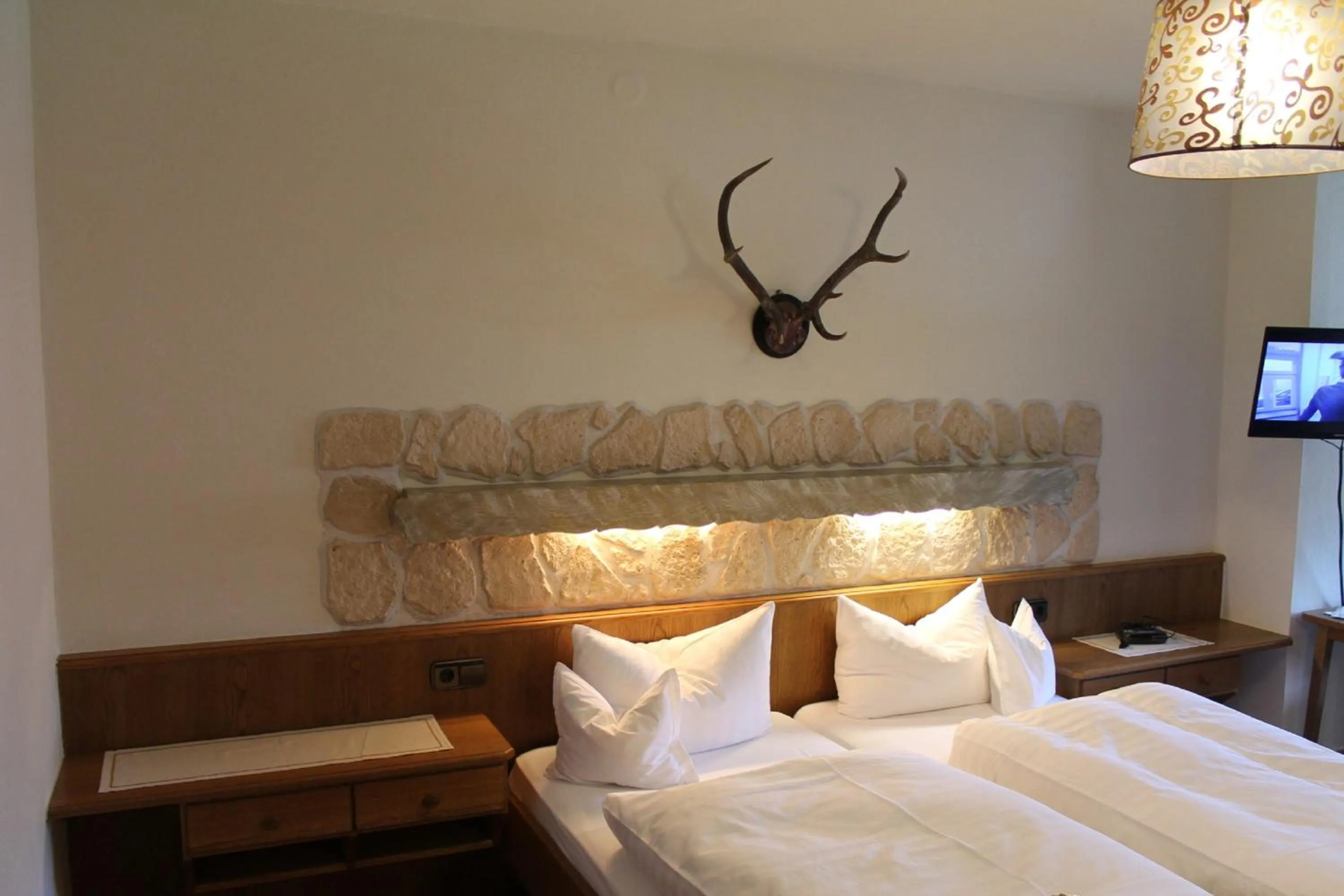 Photo of the whole room, Bed in DEVA Hotel-Restaurant Fischerwirt inklusive Chiemgau Card