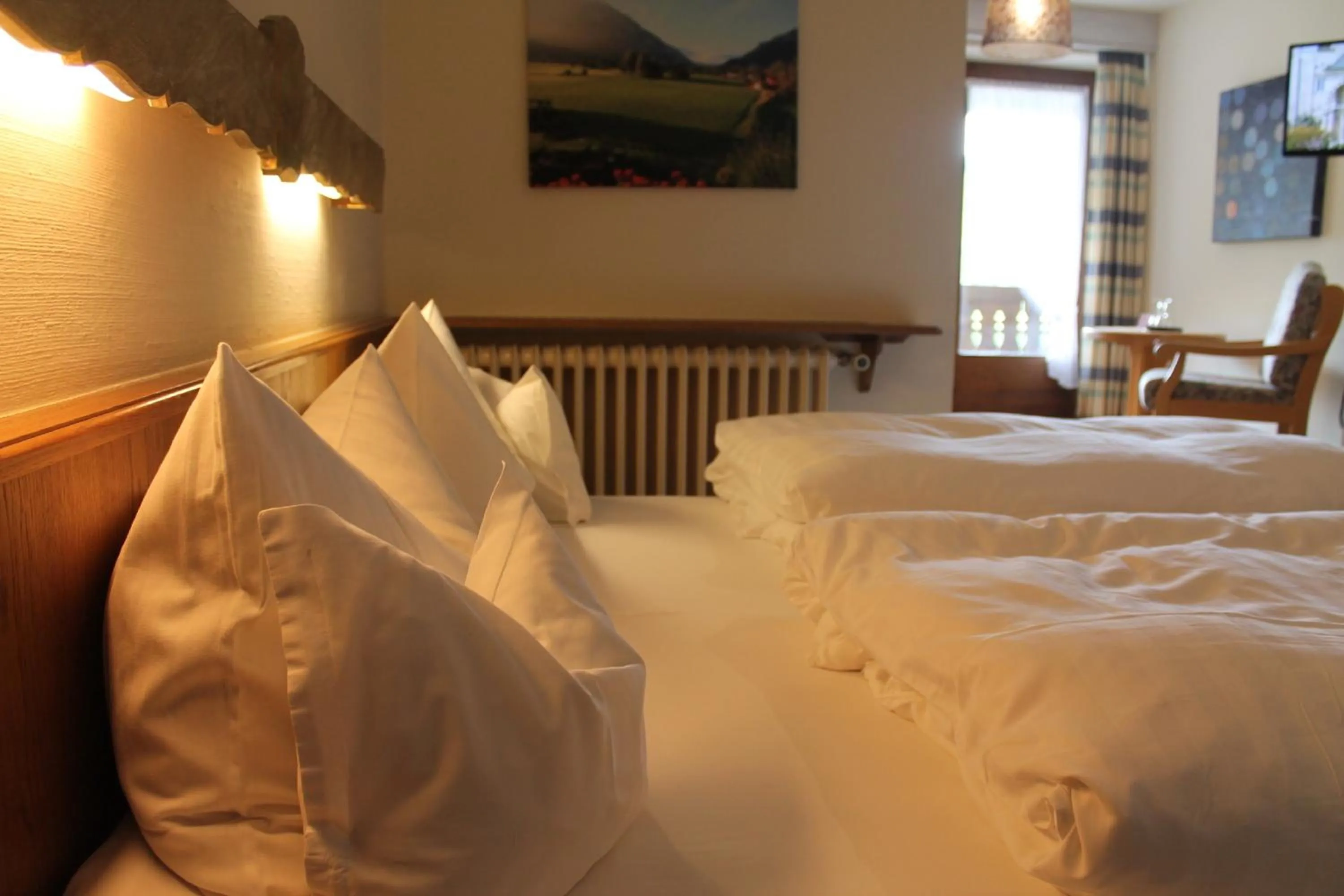 Photo of the whole room, Bed in DEVA Hotel-Restaurant Fischerwirt inklusive Chiemgau Card