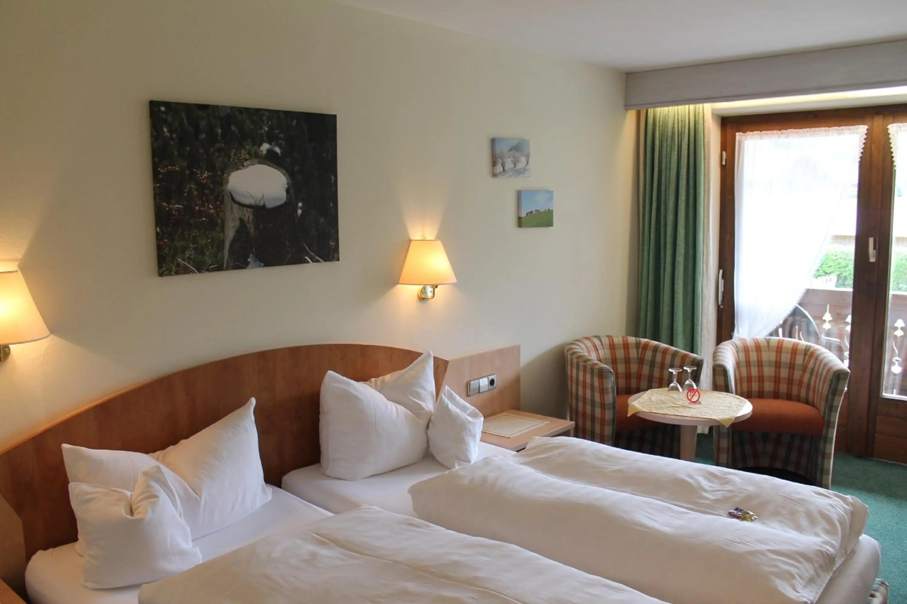 Photo of the whole room, Bed in DEVA Hotel-Restaurant Fischerwirt inklusive Chiemgau Card