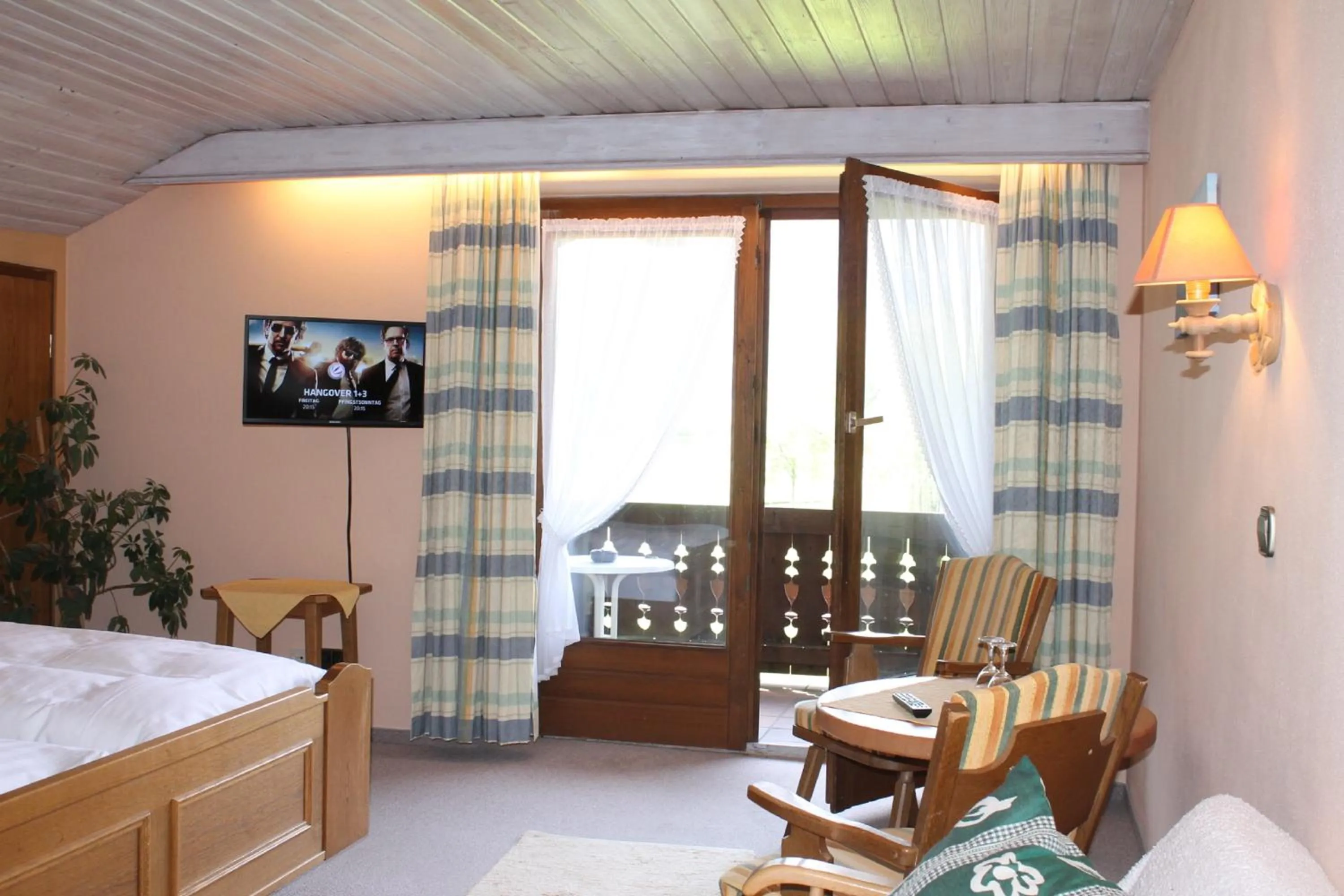 Photo of the whole room, Bed in DEVA Hotel-Restaurant Fischerwirt inklusive Chiemgau Card
