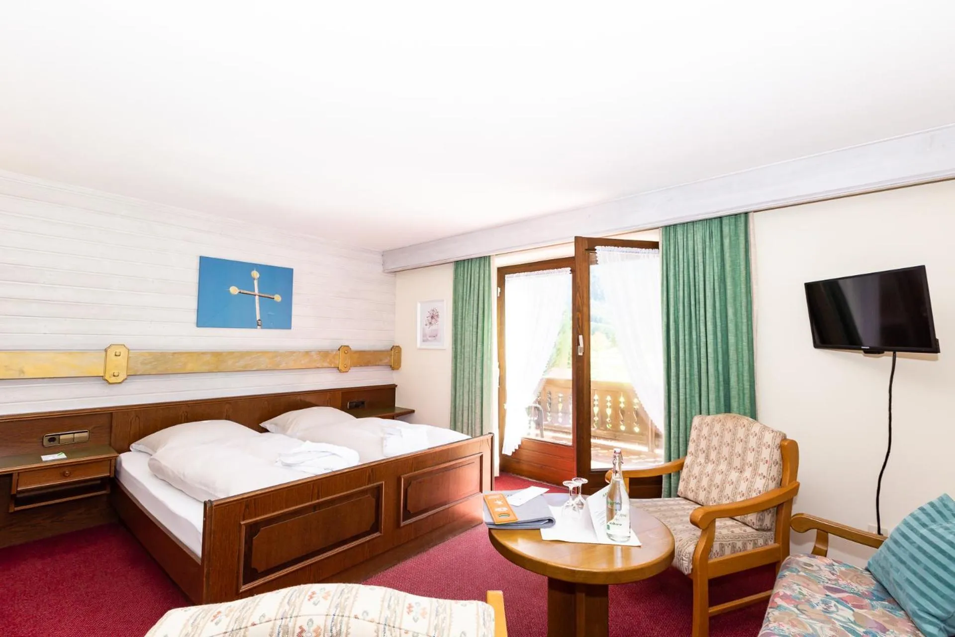 Photo of the whole room, Bed in DEVA Hotel-Restaurant Fischerwirt inklusive Chiemgau Card