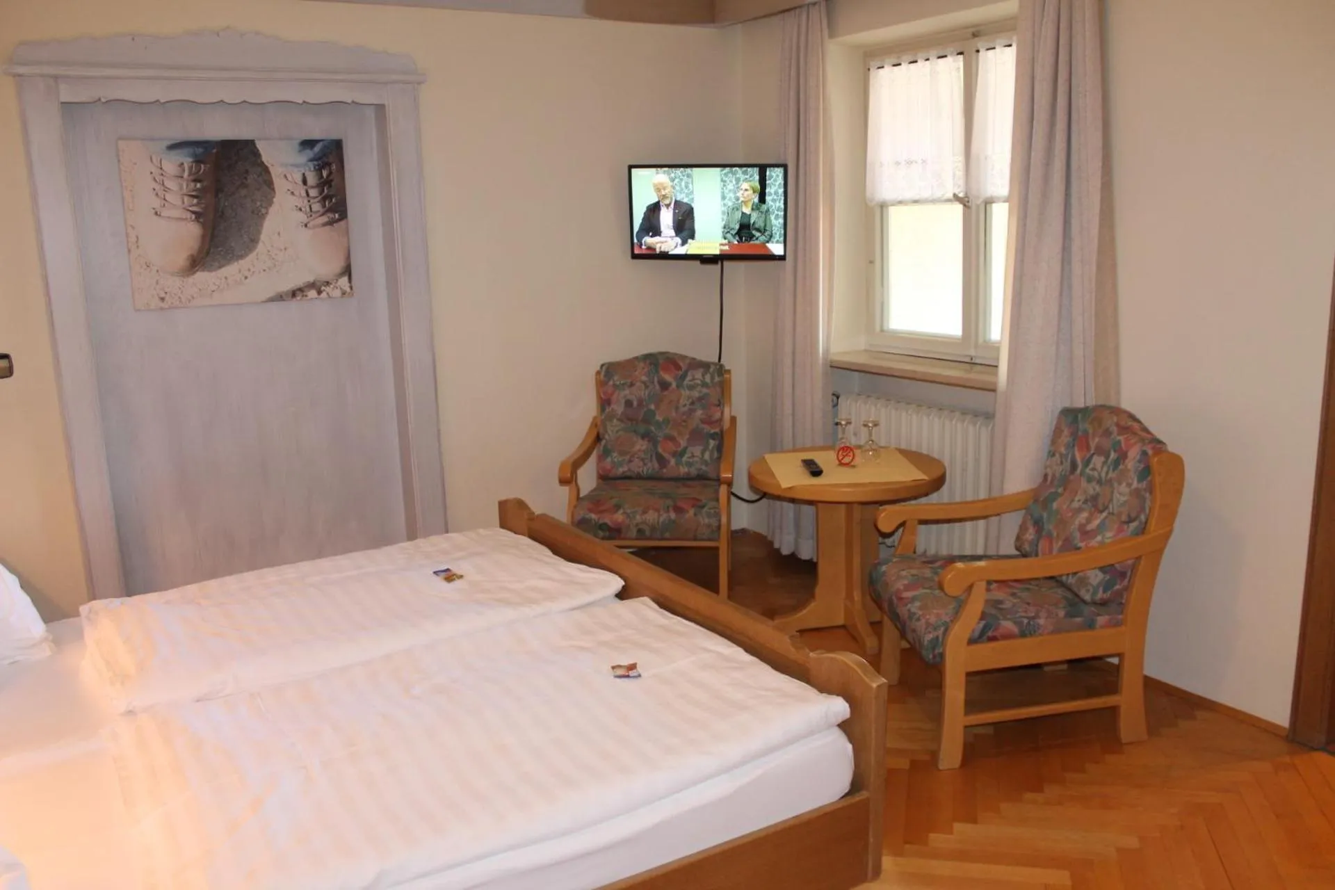 Photo of the whole room, Bed in DEVA Hotel-Restaurant Fischerwirt inklusive Chiemgau Card