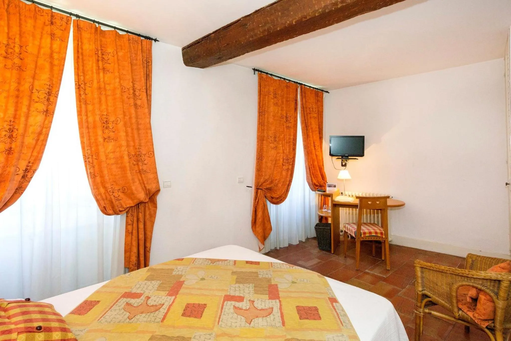 Bedroom, Bed in Logis Hôtels - Hôtel Restaurant du Midi